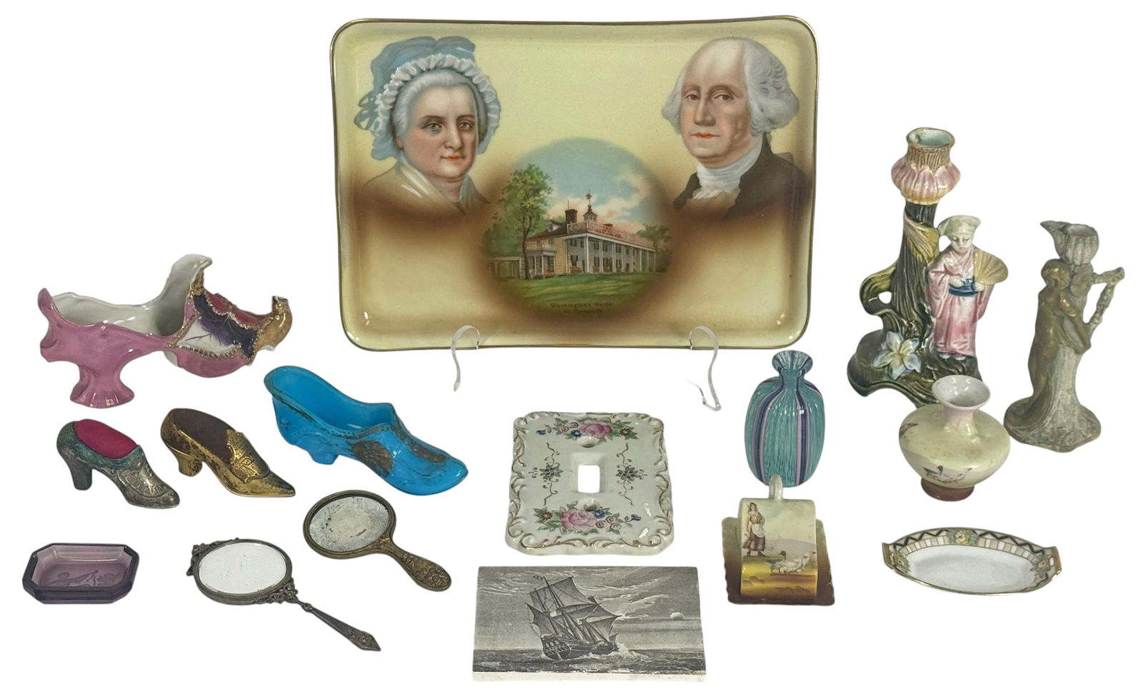 Assorted Decorative and Collectible Items 16pc LOT: Lot of sixteen vintage and antique decorative pieces, including figural shoe-form objects in ceramic and metal, a 1910 ceramic calendar plaque by Jones, McDuffee & Stratton Co., a hand-painted floral