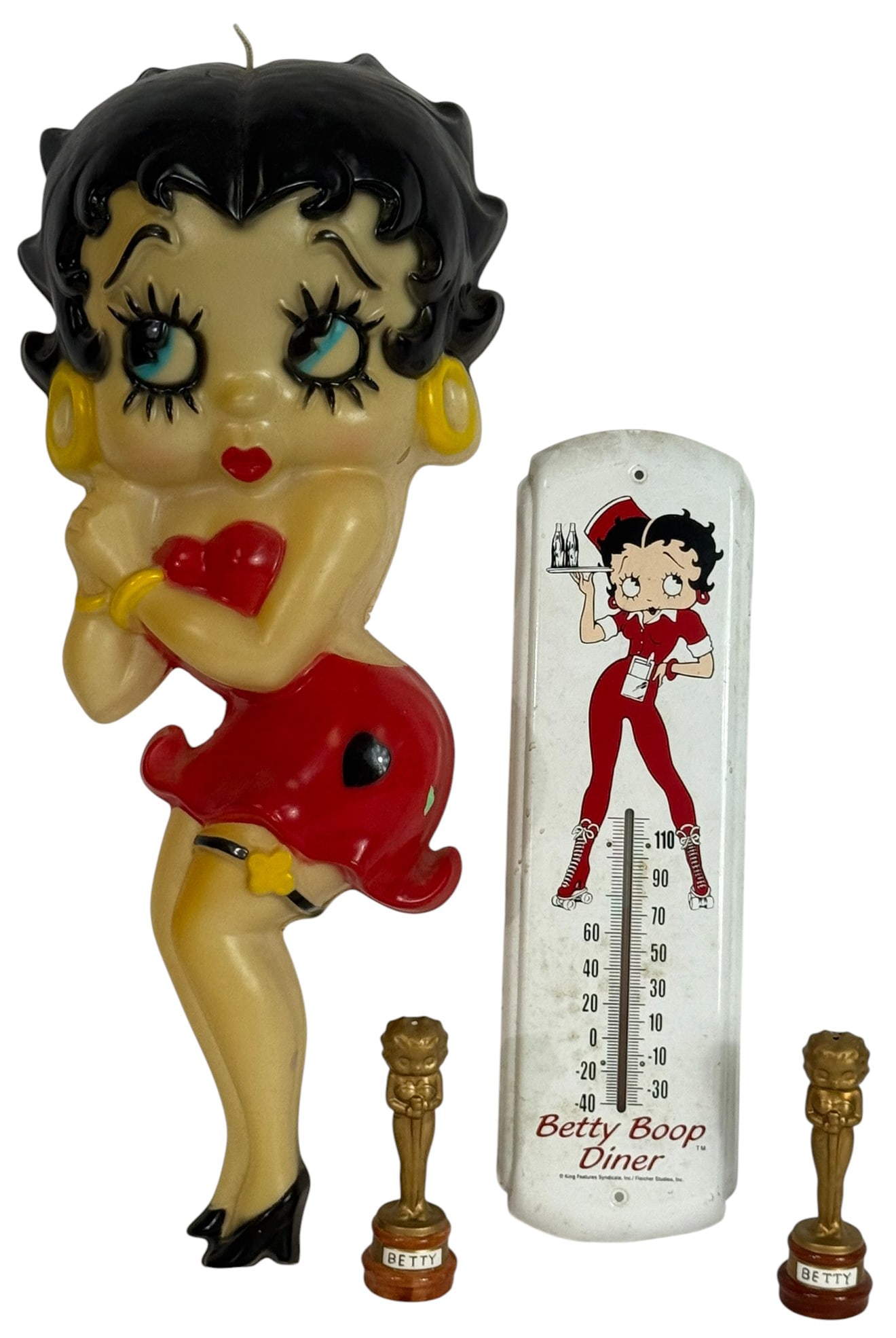 Betty Boop Collectibles Wall Decor & Salt Shakers: Lot of four vintage Betty Boop collectibles, ideal for fans and collectors of classic cartoon memorabilia. This lot includes: a Betty Boop Diner wall thermometer, a pair of ceramic molded salt & peppe