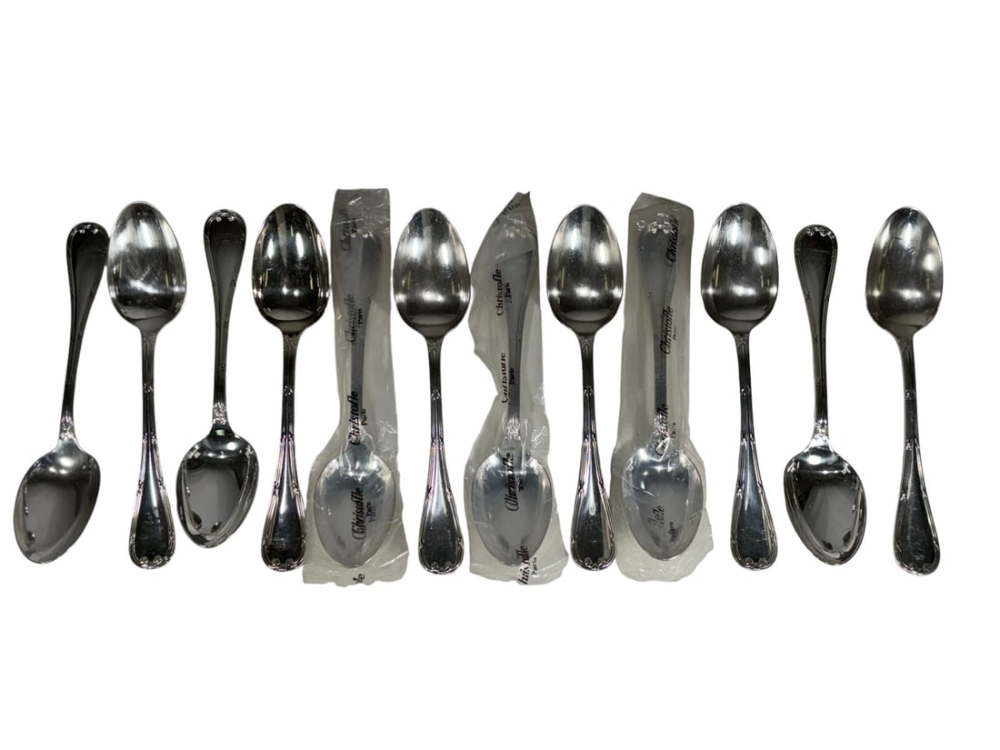 Christofle France Rubans Pattern Spoons 12pc Set: Set of twelve Christofle France silverplate spoons in the Rubans pattern. Classic ribbon motif handles with polished bowls. All are marked 'Christofle' with maker's stamp to the reverse. Each piece