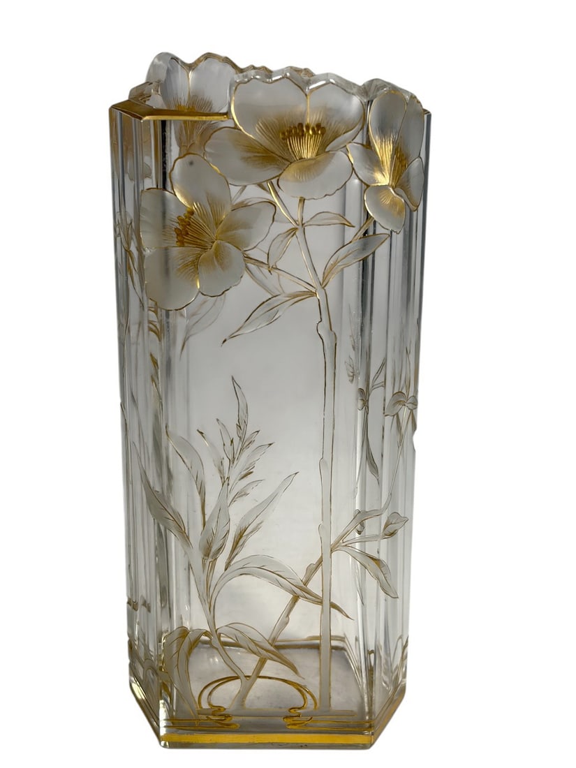 Moser Style Art Nouveau Cutted Flowers Glass Vase: Moser style Art Nouveau cut glass floral vase with sharply faceted sides and stepped base. Clear glass with engraved botanical motifs and gilt accents, scalloped petal form rim with applied