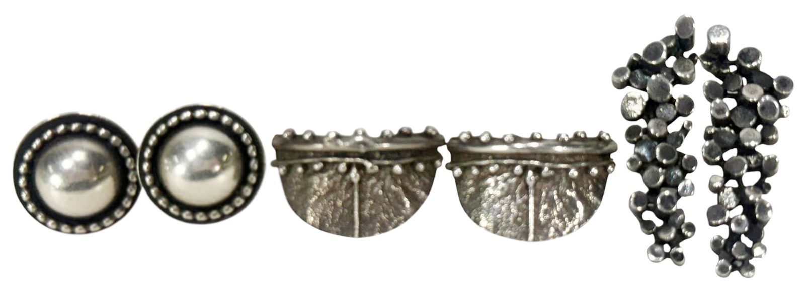 Vintage Modernist Sterling Silver Earrings 3 PAIRS: Lot of three pairs of vintage and modernist sterling silver earrings. To include a pair of round earrings crafted in the style of Georg Jensens Moonlight Blossom by Lawrence Foss; a pair of