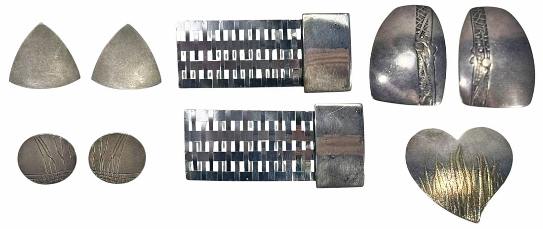 Sterling Silver Earrings & Brooch Jewelry Suite: Modernist sterling silver jewelry collection featuring four pairs of earrings and one brooch pendant. To include is a pair of studio-etched silver earrings, a second signed pair by Seattle artist