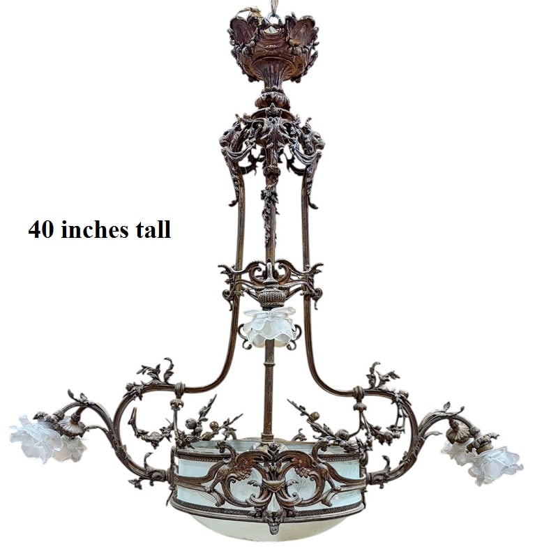 Antique French Bronze & Frosted Glass Chandelier: Antique French Rococo Revival bronze and frosted glass chandelier with scrolling foliate arms and dragon or griffin motifs. Tiered frame with pale green frosted glass panels, central frosted bowl, and
