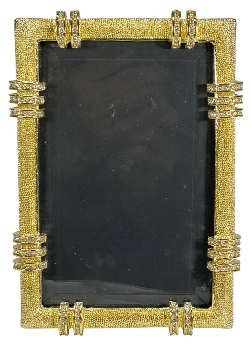 Olivia Riegel Gold Cassini Textured Picture Frame: Olivia Riegel Cassini pattern gold tone picture frame with textured surface, pave crystal ring motifs, and clear crystal bands at corners and midpoints. Beveled front glass. Taupe fabric easel back is