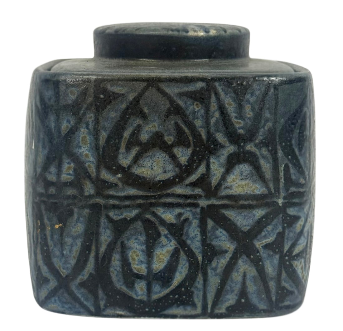 Royal Copenhagen Baca Nils Thorsson Lidded Jar: Royal Copenhagen ceramic lidded jar designed by Nils Thorsson for the Baca series. The jar features a blue glazed body with a repeating geometric relief decoration and a fitted lid with matching motif
