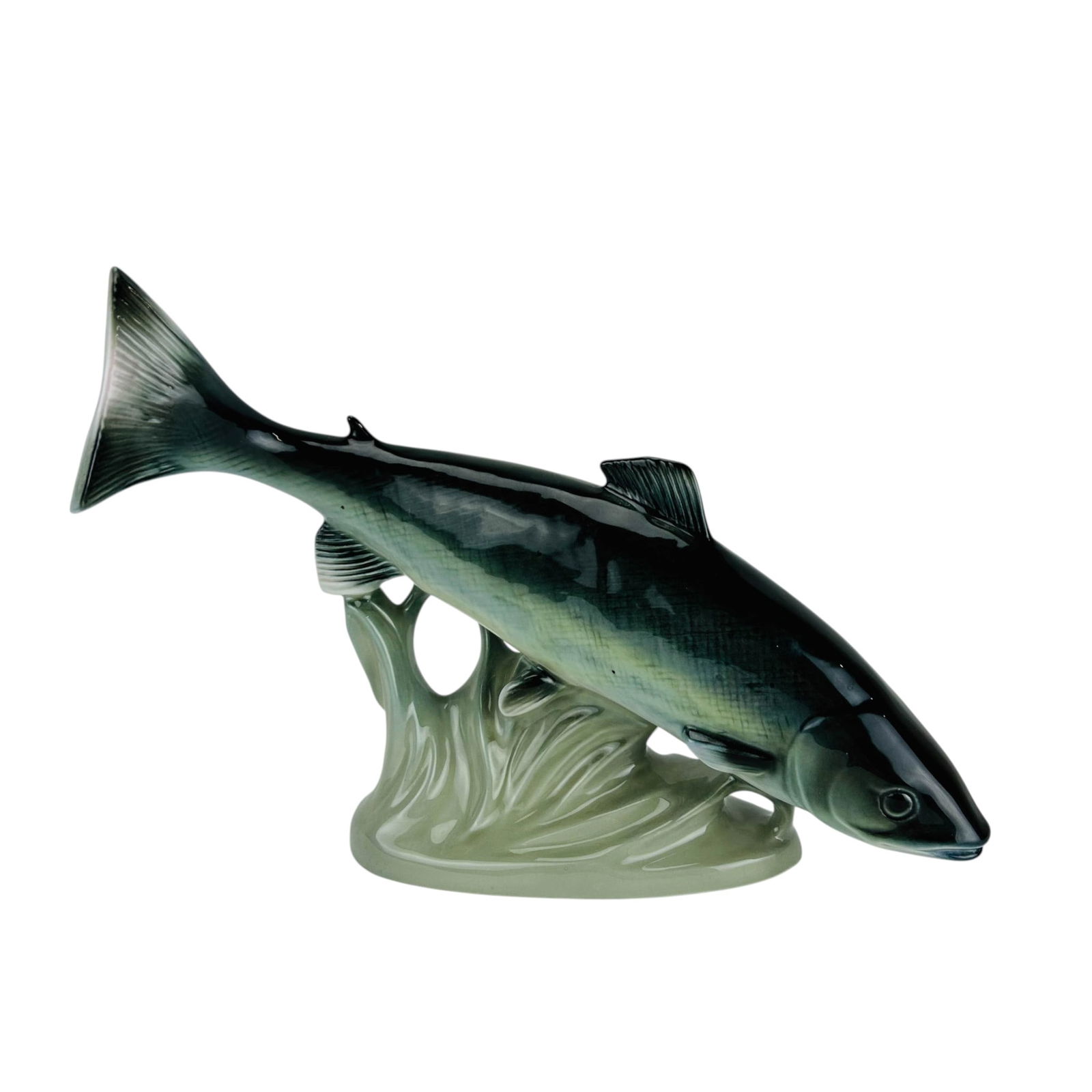 Royal Dux Bohemia Porcelain Salmon Figurine 16.5": Royal Dux Czech porcelain fish sculpture depicting a leaping salmon emerging from stylized flowing water. Finished in graduated gray, blue, and green glazes with a high gloss surface. Underside bears