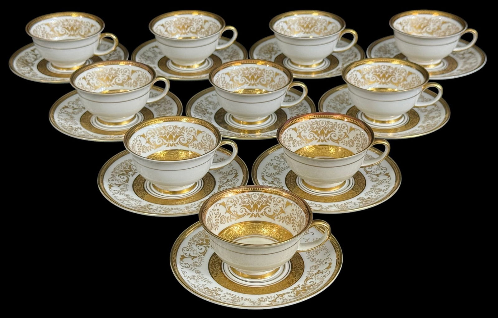 Rosenthal Aida Teacup & Saucer Service for 10 SET: Rosenthal, service for ten teacups with matching saucers in the "Aida" pattern. Designed with fine white porcelain with intricate gilt floral and scrollwork decoration, featuring lavish gold interiors