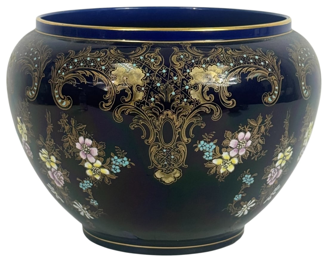 Large BFK Floral Cobalt Blue Porcelain Cachepot: Boch Freres Keramis (BFK) Belgium porcelain Deco-style cachepot featuring a rich cobalt blue ground with elaborate hand-painted gilt scrollwork and floral cartouches. The body is adorned with raised e