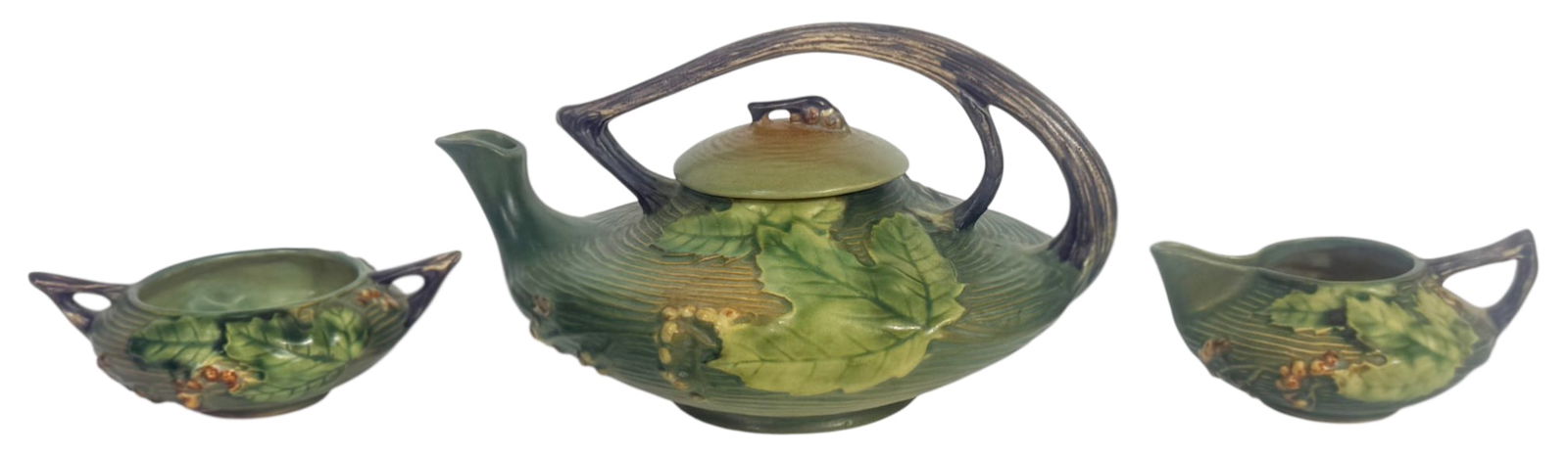 Roseville Bittersweet Pottery Teapot Sugar & Cream: Roseville 3-piece pottery tea set in the desirable 'Bittersweet' pattern. Featuring a lidded teapot, sugar and creamer. Each piece is richly molded with raised leaf and berry motifs in shaded