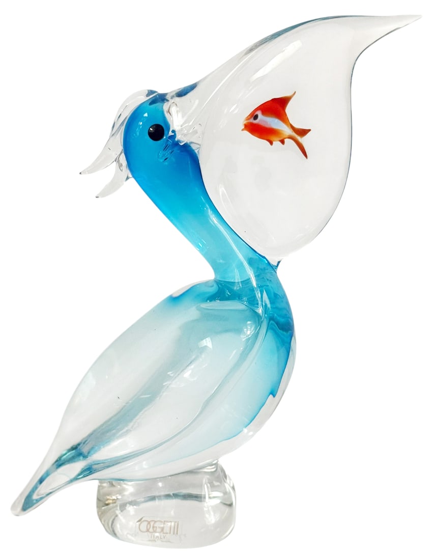 Elio Raffaeli Murano Art Glass Pelican Sculpture: Elio Raffaeli (Italian, born 1936) hand-blown Murano Venetian art glass pelican sculpture executed in a vibrant aqua blue glass with clear accents, featuring a charming encased red-orange fish in the