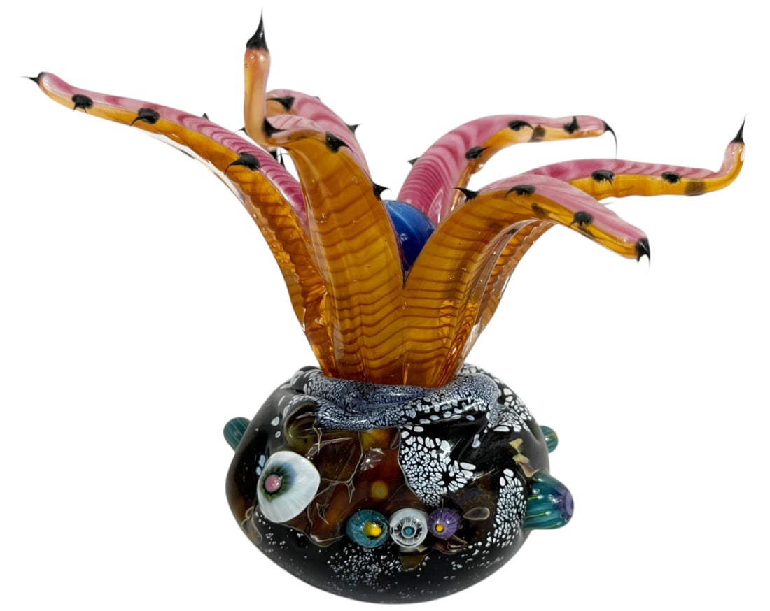 2007 Glass Eye Studio Blown Abstract Sculpture: Glass Eye Studio hand-blown art glass sculpture designed in an abstract form that features swirling tentacle-like appendages in vivid pink and amber glass with black thorns, radiating from a blue cent