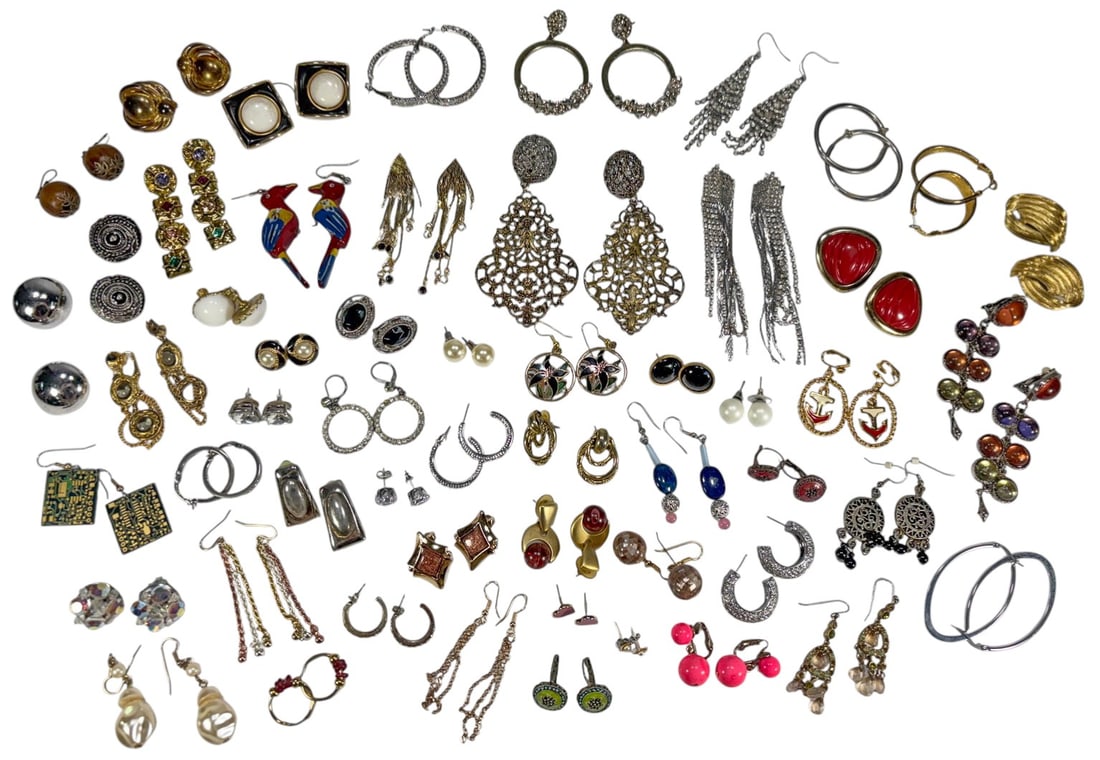 VTG Earrings Costume Jewelry Collection 107pc LOT: Group of 107 vintage costume earrings, pairs and singles, in mixed styles and finishes, including hoops, rhinestone dangles, enamel and novelty pieces, faux pearls, and geometric designs. The largest
