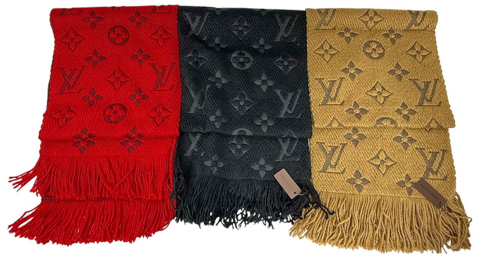 Designer-Inspired Monogram LV Wool Scarves 3pc LOT: Lot of three designer-inspired scarves featuring crafted in a heavy woven knit with bold motifs throughout, including floral emblems and prominent 'LV'-style initials. The set includes one scarf in de
