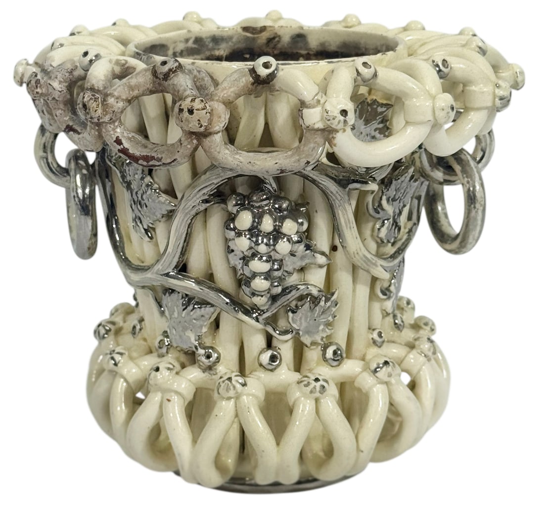 French Langeais Style Earthenware Grape Vine Vase: French Langeais earthenware-style vase attributed to Charles de Boissimon, featuring an openwork looped design with applied grape clusters and vine motifs. The cream glazed body is accented with metal