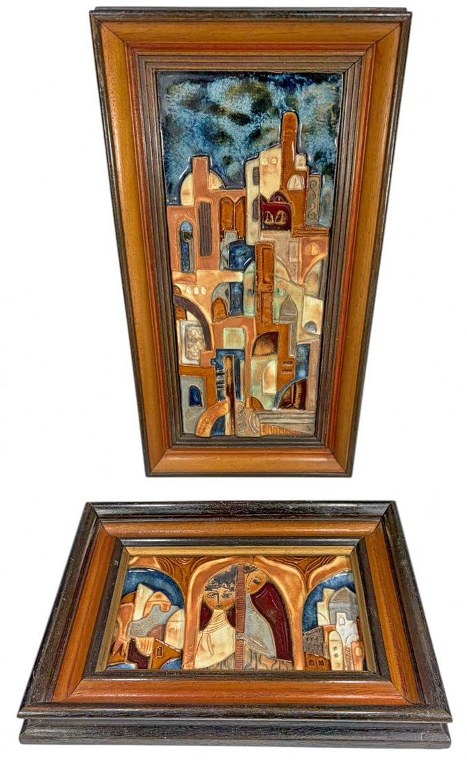 Ruth Faktorowicz Israeli b1937 Ceramic Plaque 2pcs: Ruth Faktorowicz (Israeli, born 1937), pair of ceramic art plaques featuring stylized architectural and figural scenes in raised relief with glazed tones of blue, tan, cream, and rust. One depicts a M