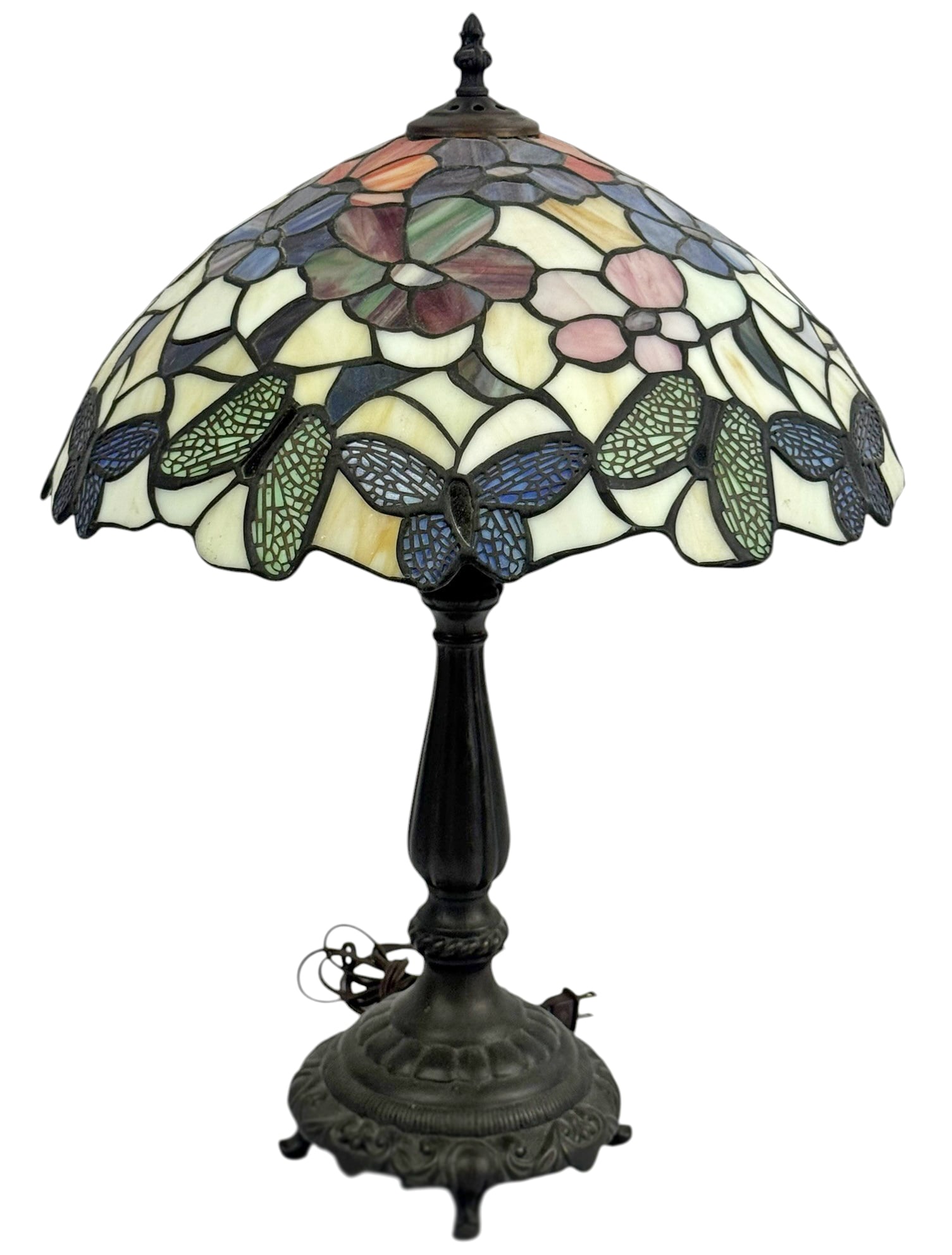 Tiffany Style Butterfly Stained Glass Table Lamp: Tiffany style table lamp featuring a stained glass shade decorated with floral motifs and butterfly accents around the lower border. The shade is composed of multicolor leaded glass panels in cream, b