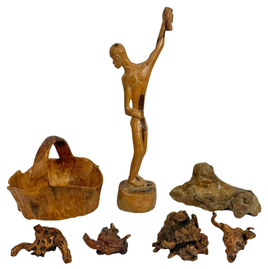 Mixed Carved Burl Wood Sculptures & Decor 7pc LOT: Collection of seven carved and natural wood decorative objects including a tall hand carved figure sculpture, a carved burl wood basket, a wood slab, and several natural burl or root carvings. Pieces
