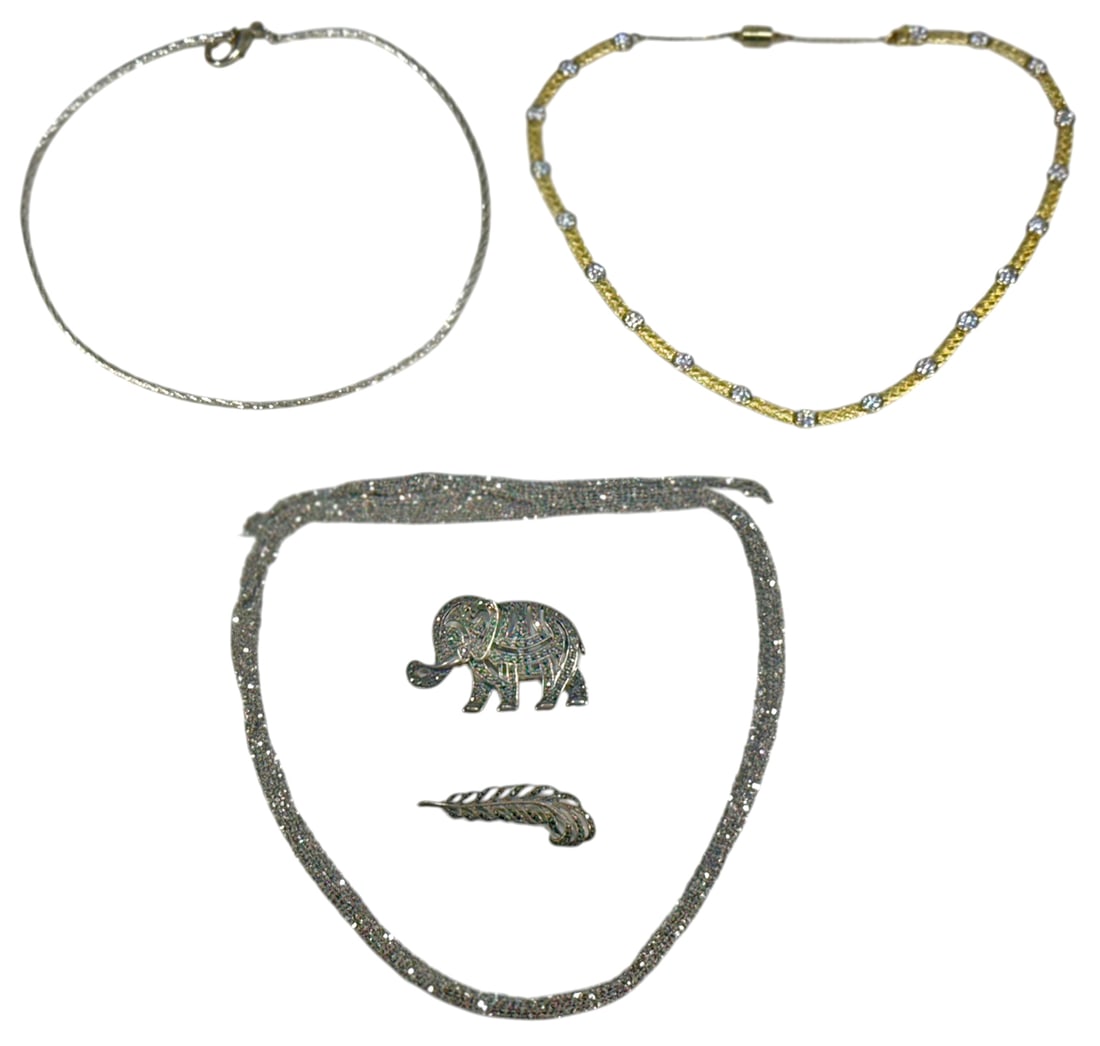 Sterling Silver Necklaces & Pendant Brooches 5pcs: Grouping of five sterling silver jewelry pieces including three necklaces and two brooches/pendants. To include an Italian twisted rope chain necklace, a vermeil and white CZ stone station necklace, a