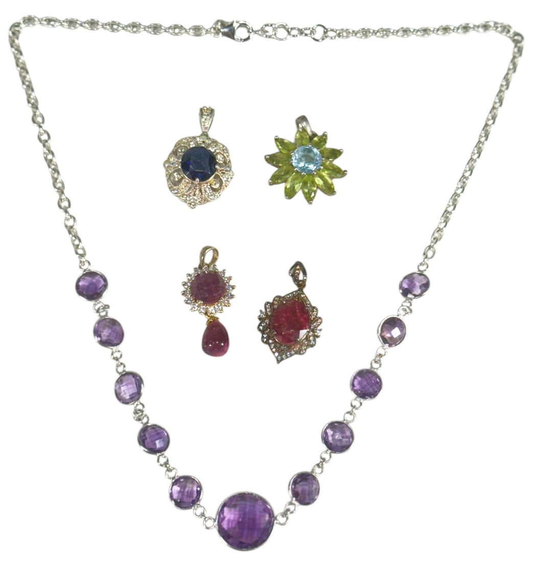 Sterling Silver Pendants & Necklace Jewelry Suite: Collection of five sterling silver jewelry items including a faceted amethyst bezel-set necklace and four colorful gemstone pendants. The necklace features round-cut amethysts in graduated sizes, each