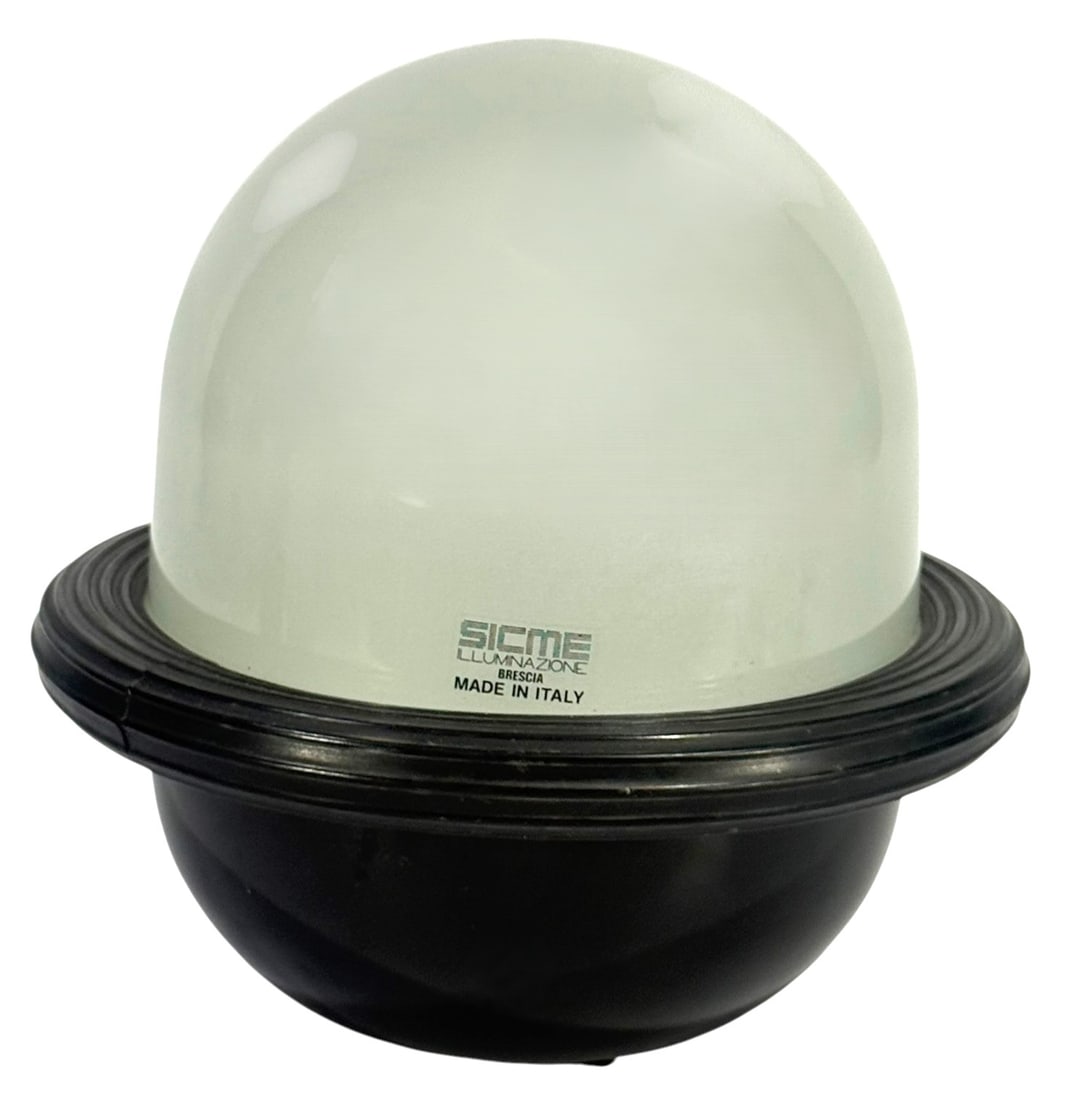1980s Italian Sicme Amento UFO Table Lamp: Sicme Illuminazione Brescia, Amento collection post modern UFO form table lamp. Circa: Italy, 1980s. Features a smoked dome diffuser over a black base creating a soft ambient light effect.Condition: G