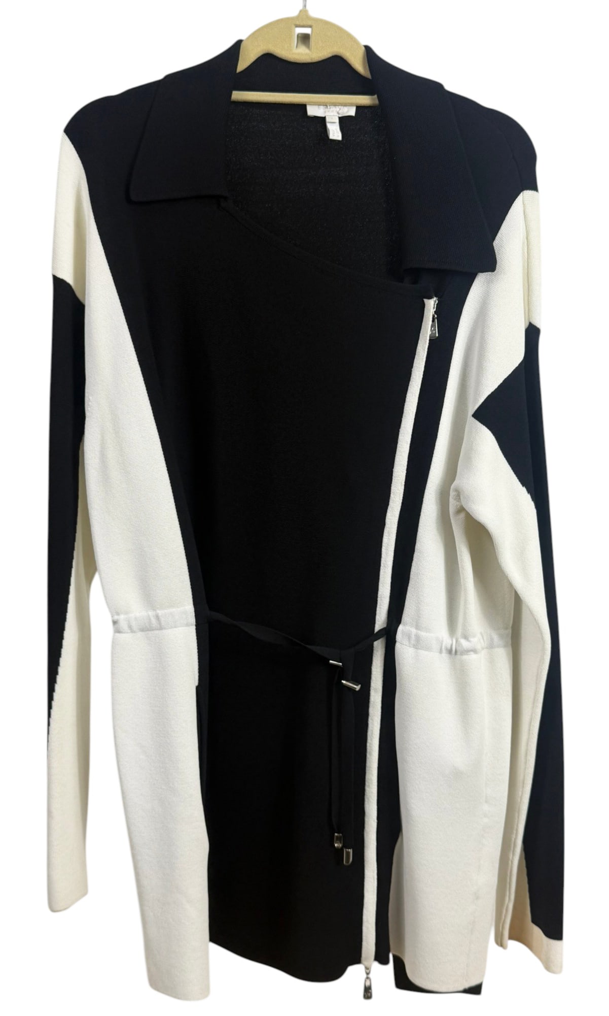 Escada Sport Black & White Zip-Up Ladies Cardigan: Escada Sport, black and white color block knit cardigan with asymmetrical front zip closure and fold over collar. Features contrasting panel design with adjustable interior tie detail and small logo c
