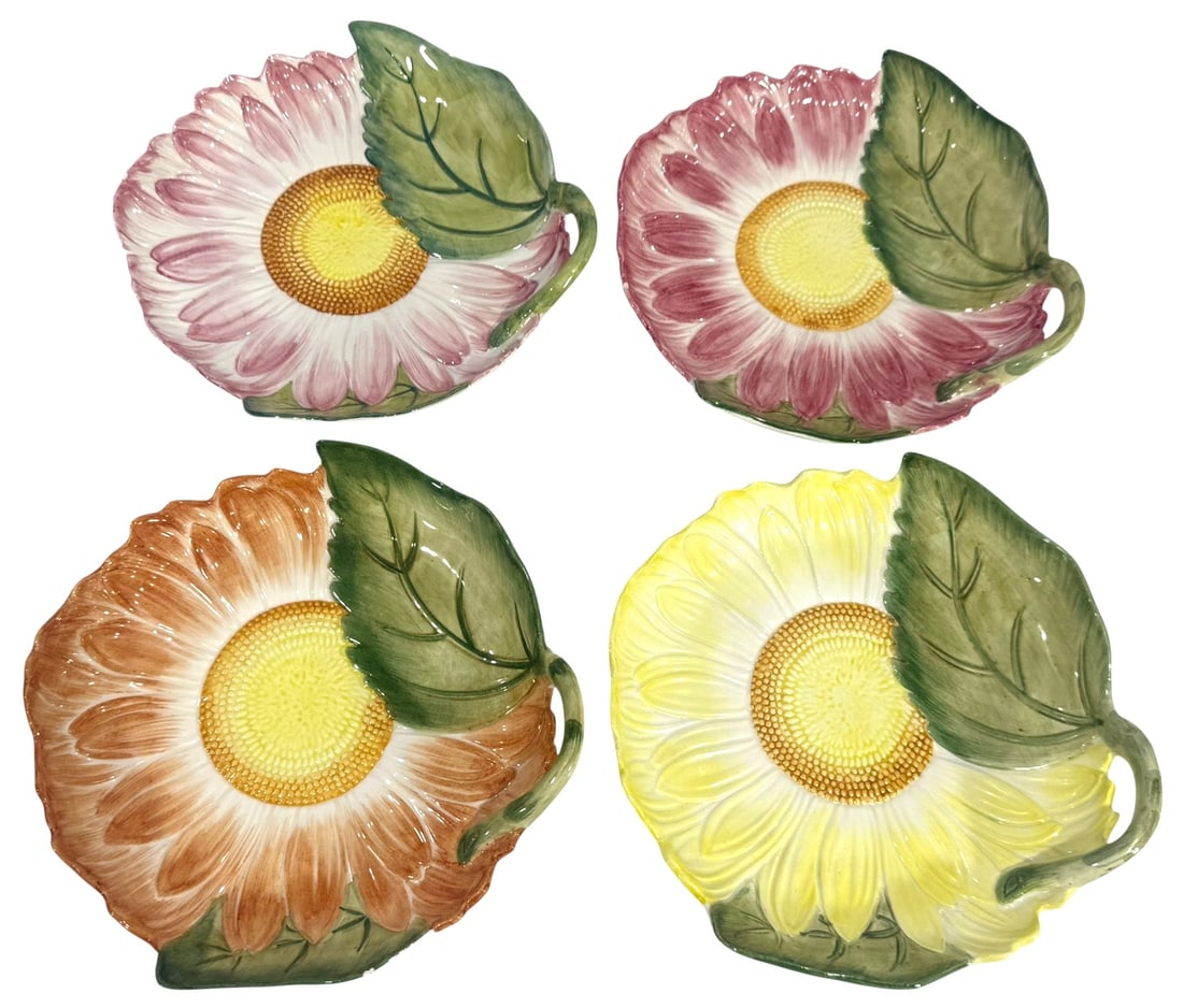 Tiffany Co. Mottahedeh Sunflower Ceramic Dish 4pcs: Tiffany & Co., set of four Mottahedeh sunflower form ceramic dishes with sculpted petal rims and applied leaf handles. Each dish features a textured sunflower center with hand painted petals in varyin