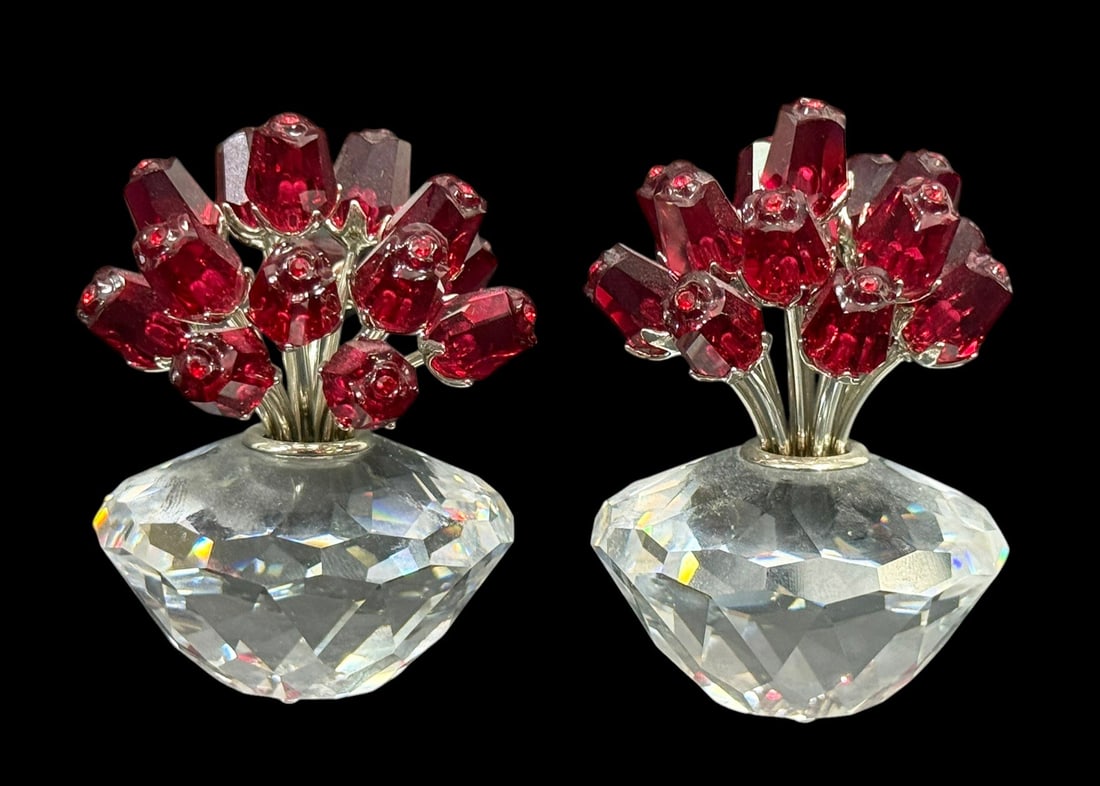 Swarovski Crystal Floral Figurines w/ Stands 6pcs: Swarovski, a group of six crystal floral themed pieces including a faceted rose, orchid blossom, and two red crystal flower bouquets on faceted bases. The lot also includes two metal stands with