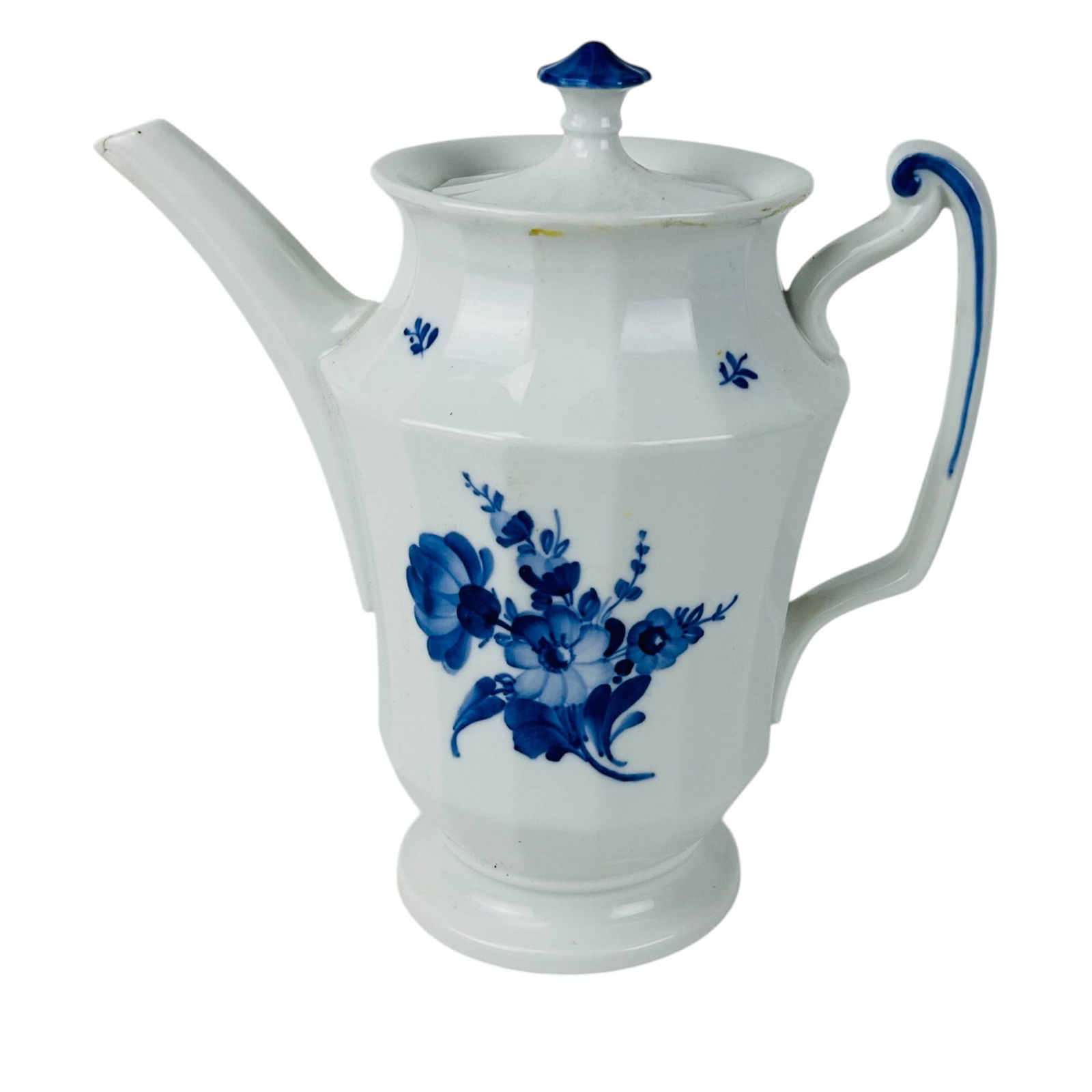 Royal Copenhagen Blue Flowers Porcelain Coffee Pot: Royal Copenhagen Danish porcelain lidded coffee pot decorated in the classic Blue Flower pattern. Production years 1913-2002. Decorated with a hand painted cobalt floral motif on a white ground. The p