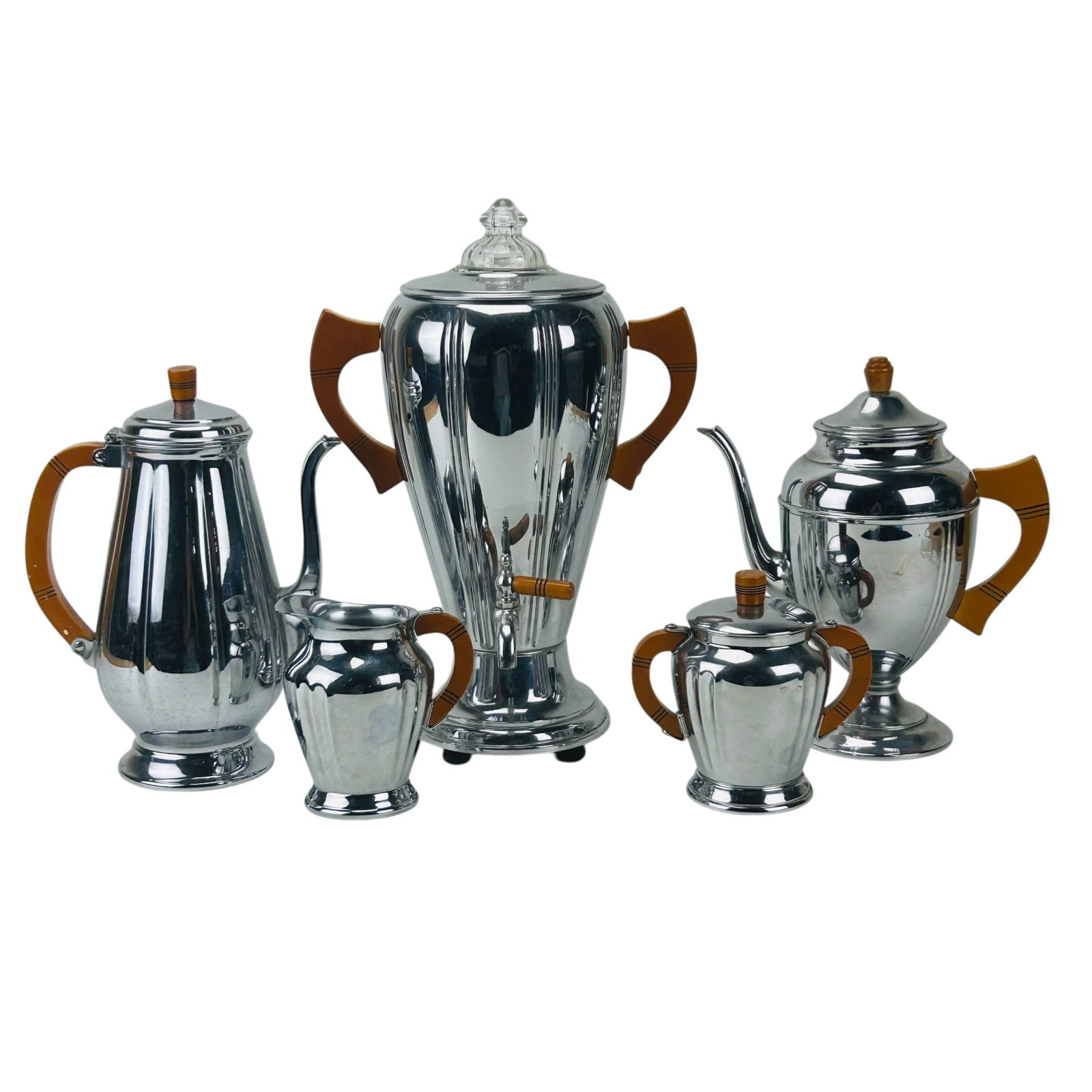 Farber Bros Krome Kraft Art Deco Coffee Service: Farber Bros Krome Kraft chrome coffee service set with yellow butterscotch Bakelite handles. Group includes a coffee urn with spigot and glass finial lid, coffee pot, teapot, sugar bowl with cover, cr