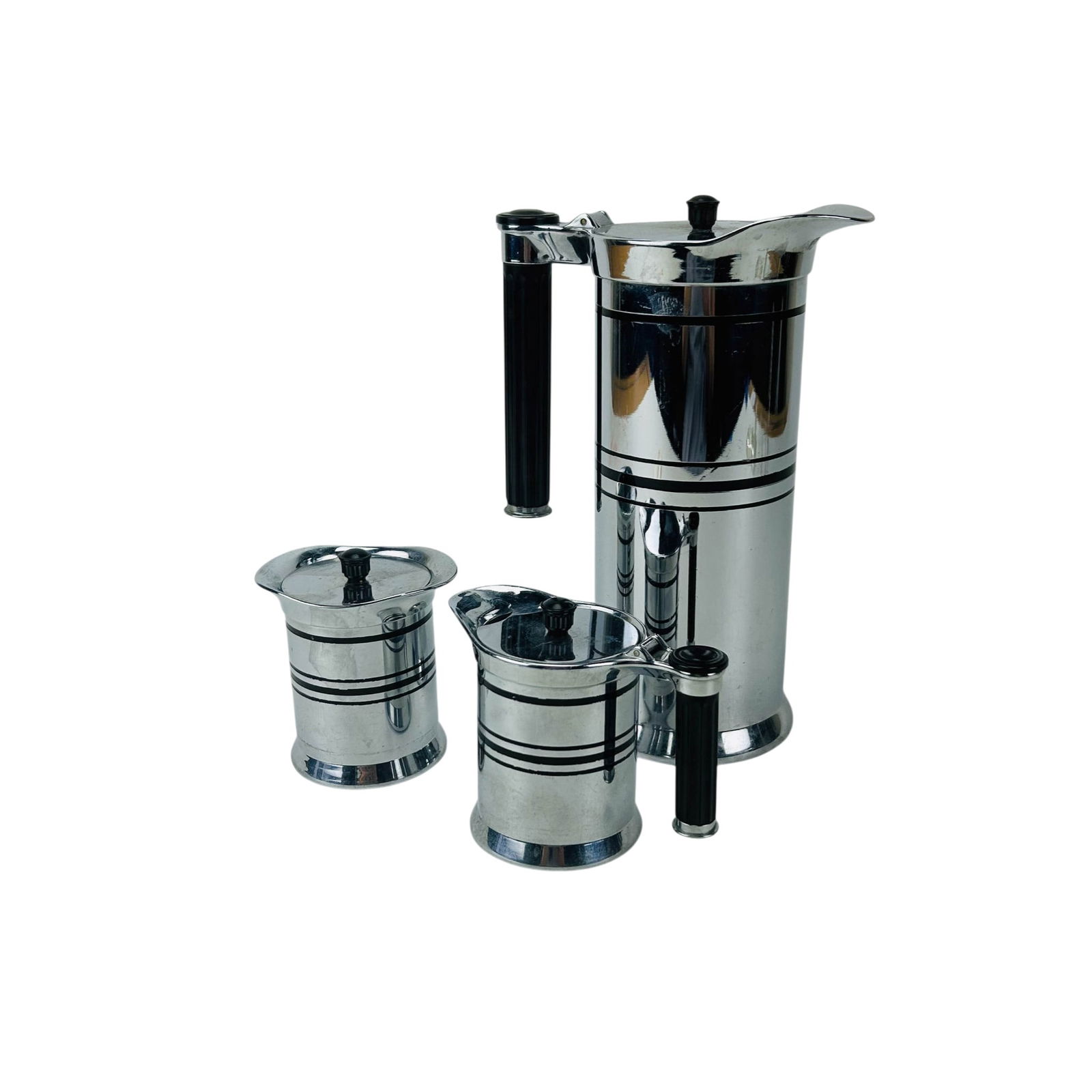 Sunbeam Art Deco Chrome Coffee Pot Creamer & Sugar: Sunbeam chrome coffee service set including coffee pot, creamer, and covered sugar bowl. Cylindrical forms with horizontal band decoration and black handles and finials. Hinged lid to creamer and remo