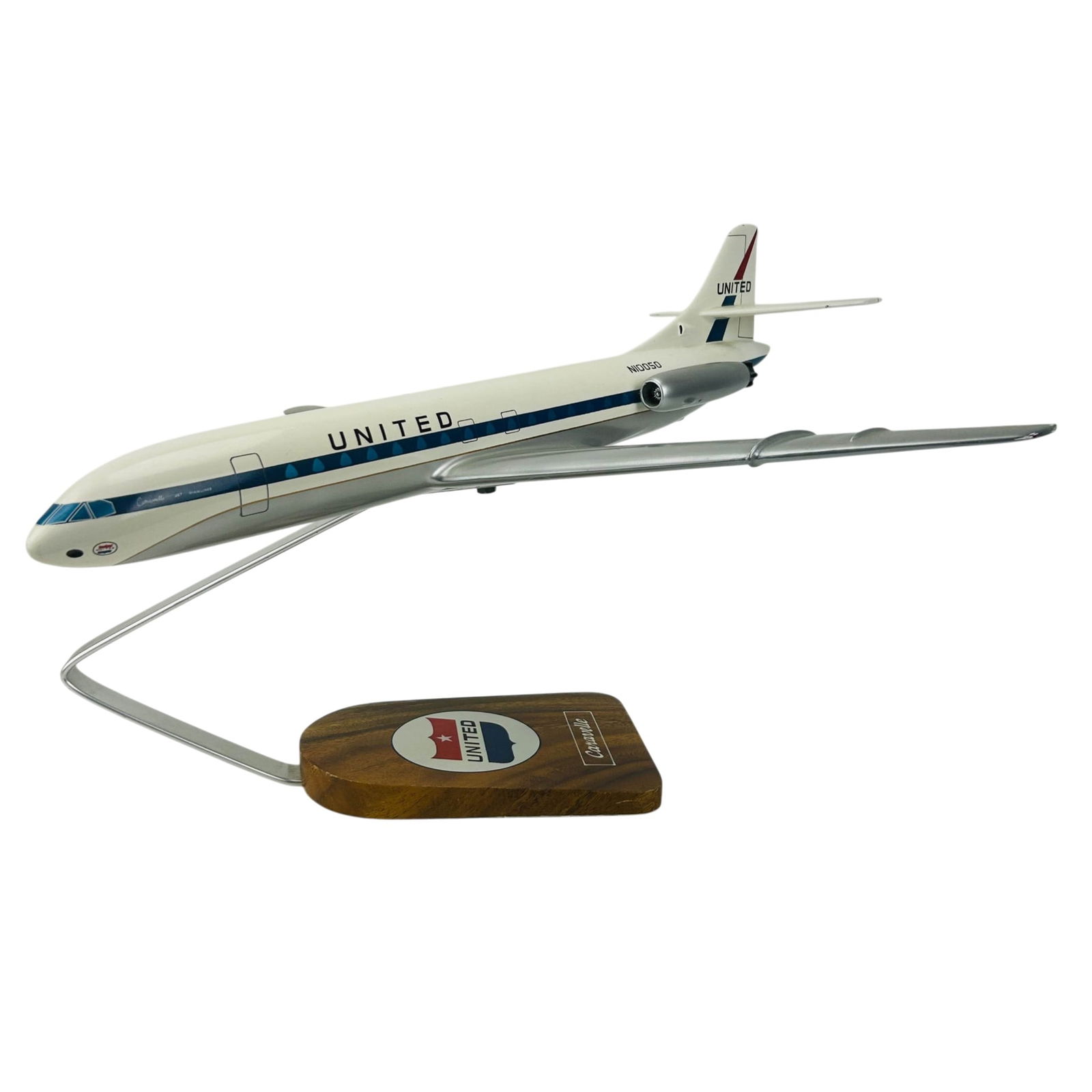 United Airlines Caravelle Jet Aircraft Plane Model: United Airlines Caravelle Jet promotional desk plane model mounted on display stand. Depicts the Sud Aviation SE 210 Caravelle passenger aircraft in United livery with blue stripe, tail logo, and regi