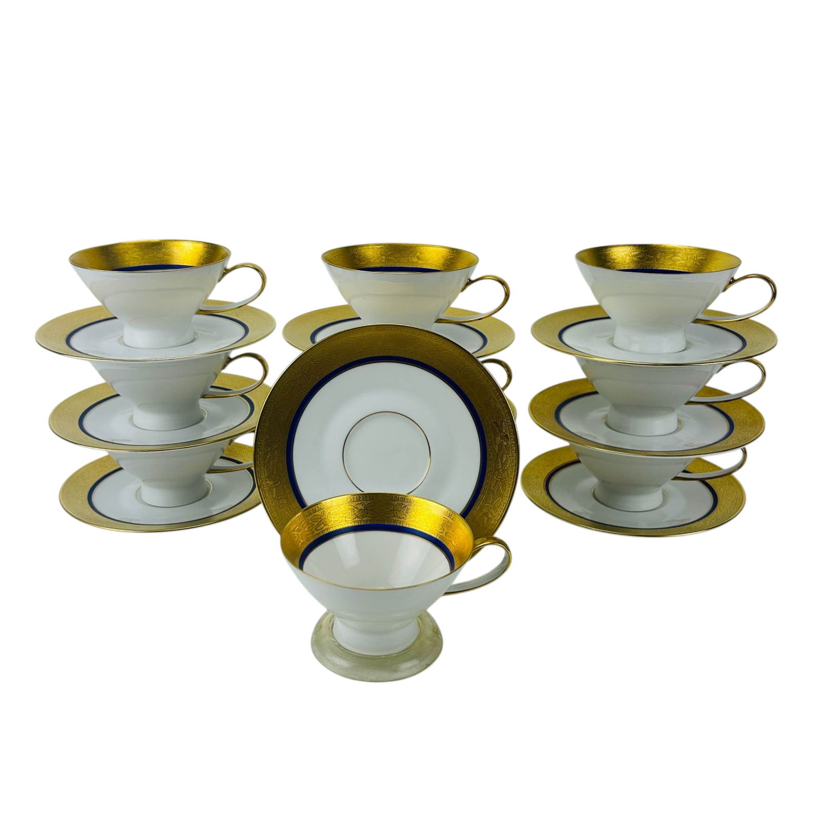 Rosenthal Gold & Cobalt Band Cup & Saucer 10pc SET: Rosenthal Germany porcelain lot of ten cups with ten matching saucers, total of twenty pieces. Each features a richly engraved gilt border accented by a deep cobalt blue band surrounding the white cen