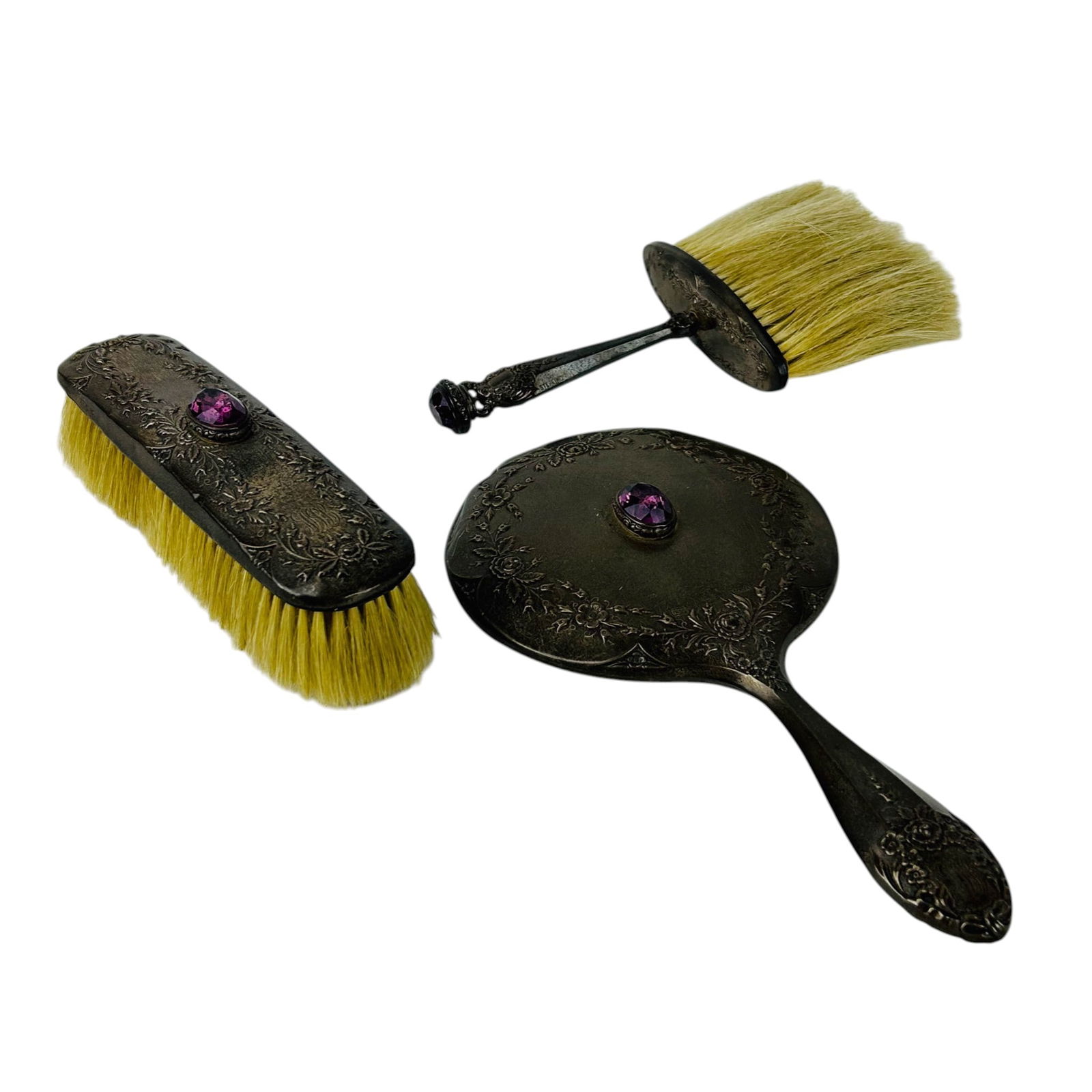 Foster Bailey Sterling Vanity Set Mirror Brush 3pc: Three piece Foster & Bailey sterling silver 925 vanity dresser set including a hand mirror, clothes brush, and hair brush. Each piece displays repousse floral decoration with a central oval pink stone