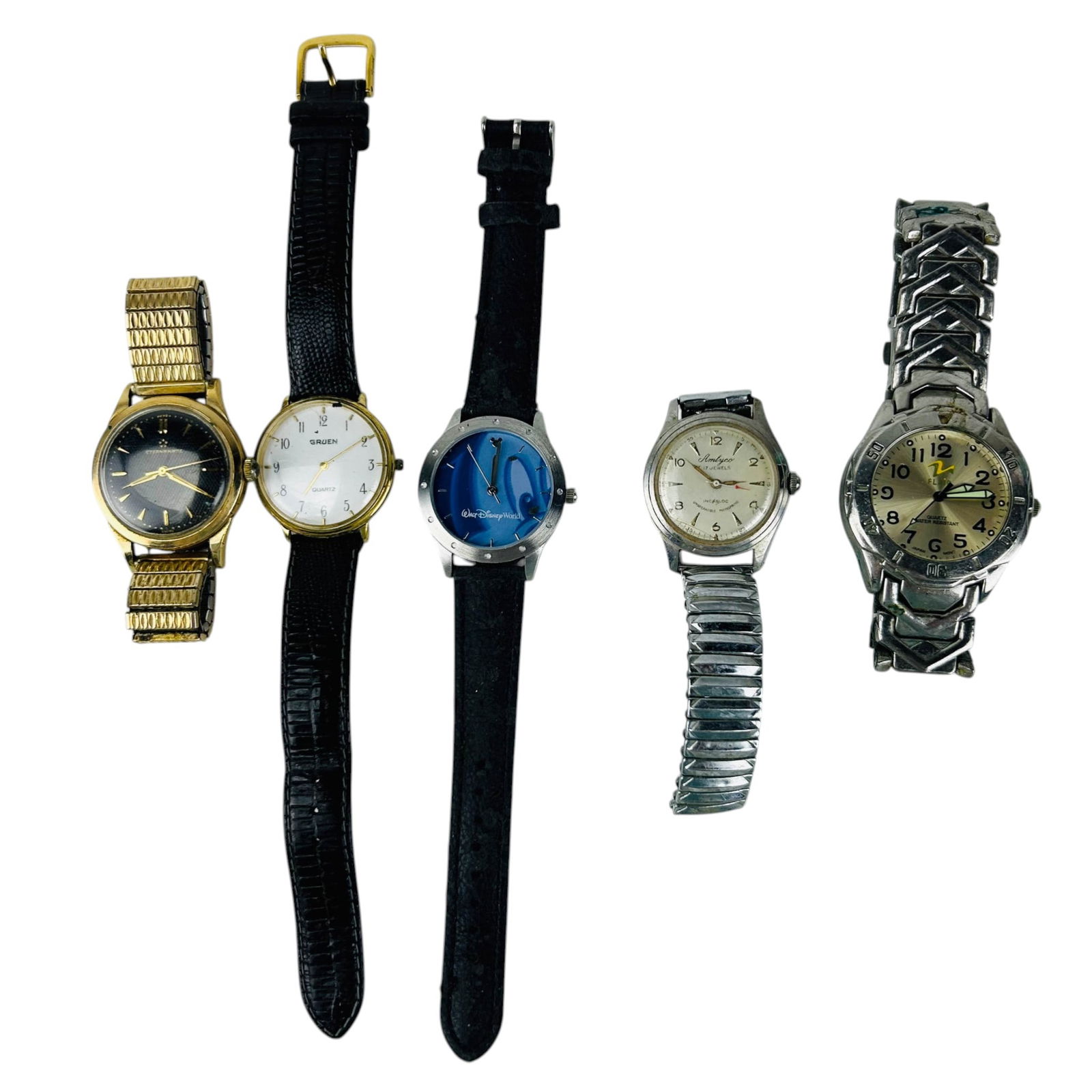 Eternamatic Gruen Amlyco Disney Wristwatch LOT 5pc: Collection of five wristwatches. The lot features a gold tone Eterna-Matic automatic watch with textured black dial and metal bracelet, Gruen quartz watch with white dial and black strap, Amlyco 17 je