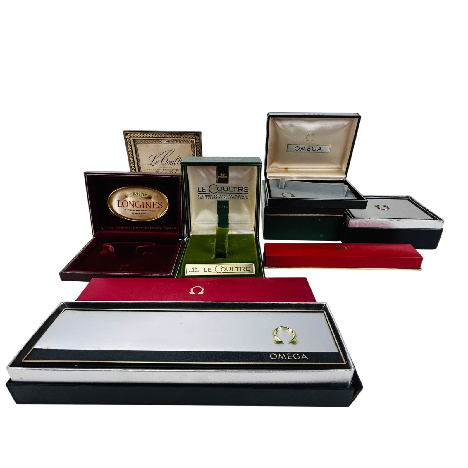 LeCoultre Omega Longines EMPTY Display Watch Boxes: Group of watch presentation boxes including Omega, Longines, and LeCoultre examples. Lot includes multiple Omega cases in black and red finishes, a Longines red hinged box, and a LeCoultre box green e
