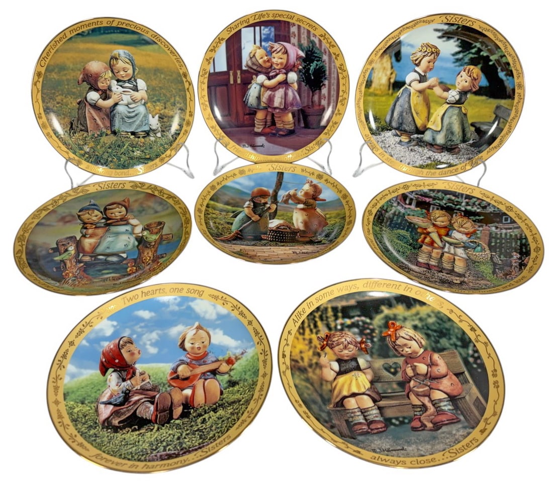 Goebel Hummel L/E 'Sisters' Porcelain Plates 8pcs: M I Hummel Sisters collection limited edition porcelain plates by The Danbury Mint, set of eight with figural scenes of children, gilt borders, and inscribed sentiments, marked to reverse. Each piece