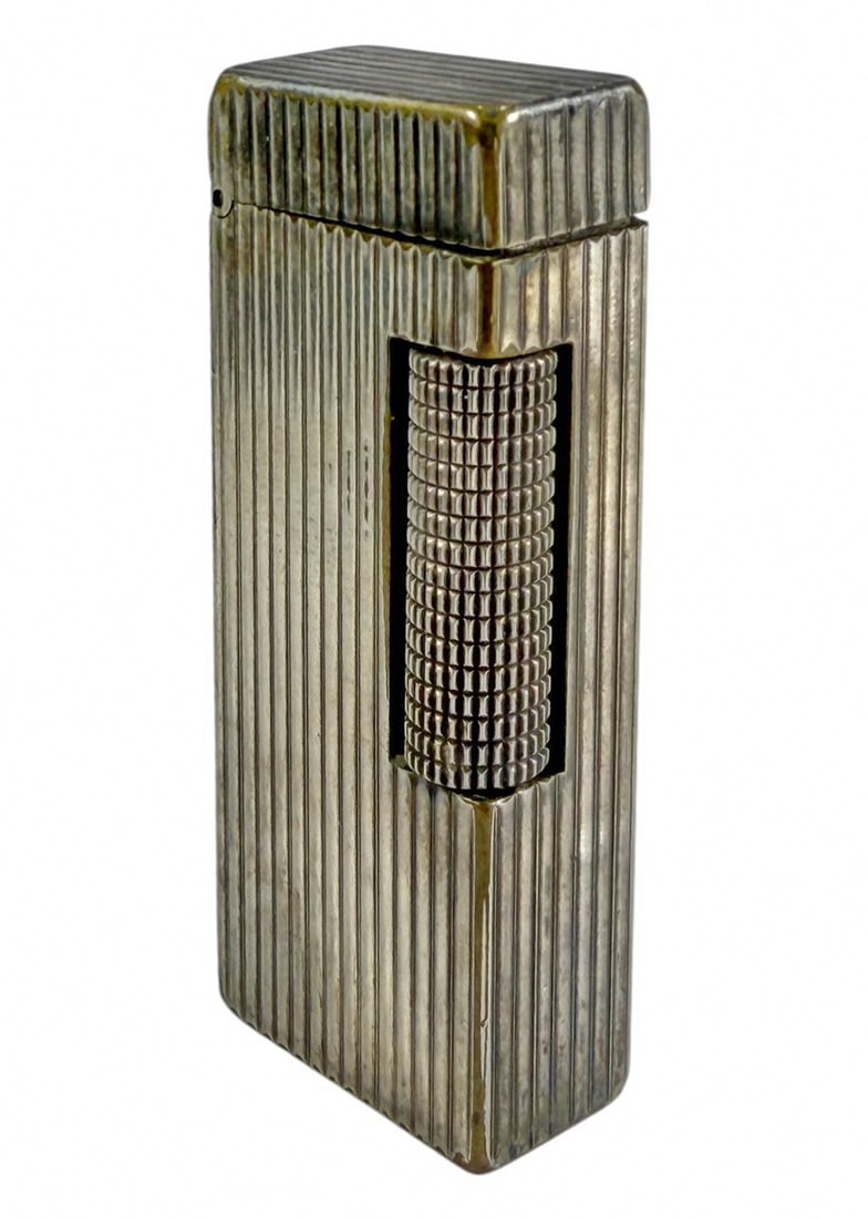 Dunhill Rollagas Swiss Made Silver Plated Lighter: Dunhill Rollagas lighter in silver plated finish with vertical ribbed pattern, Swiss made, classic side roller ignition, includes original Dunhill presentation box. Marked 'Dunhill, Made in Switzerlan