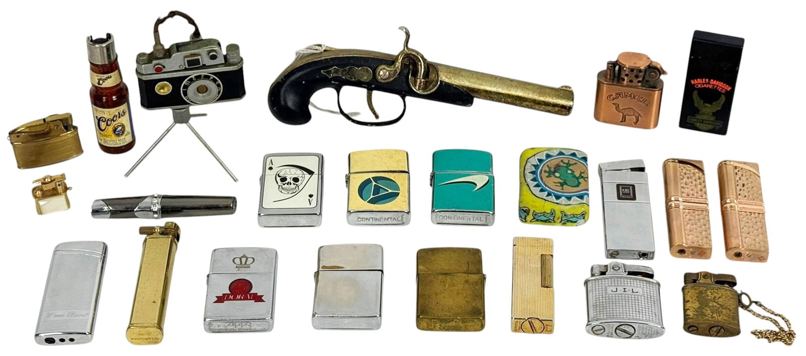 23 Vintage Lighters Zippo Camel Continental & More: Collection of twenty three vintage lighters including a variety of advertising, novelty, and classic designs. The group includes multiple Zippo lighters such as a Zippo Bradford PA example and a Dior