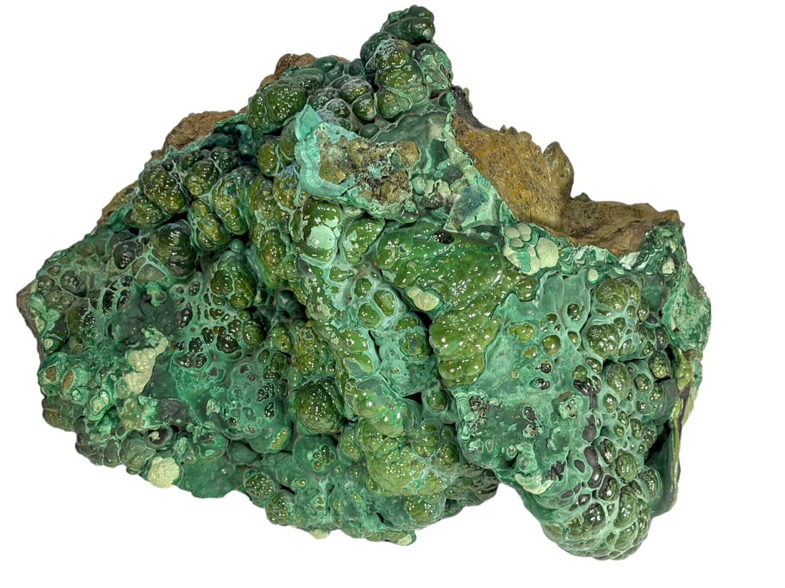 Natural Botryoidal Malachite Mineral Specimen: Natural malachite botryoidal specimen with rich green tones, glossy luster, and visible banding. Retains natural matrix to the reverse.Dimensions: 8.5 X 14 X 7.5 in. Condition: Good overall condit