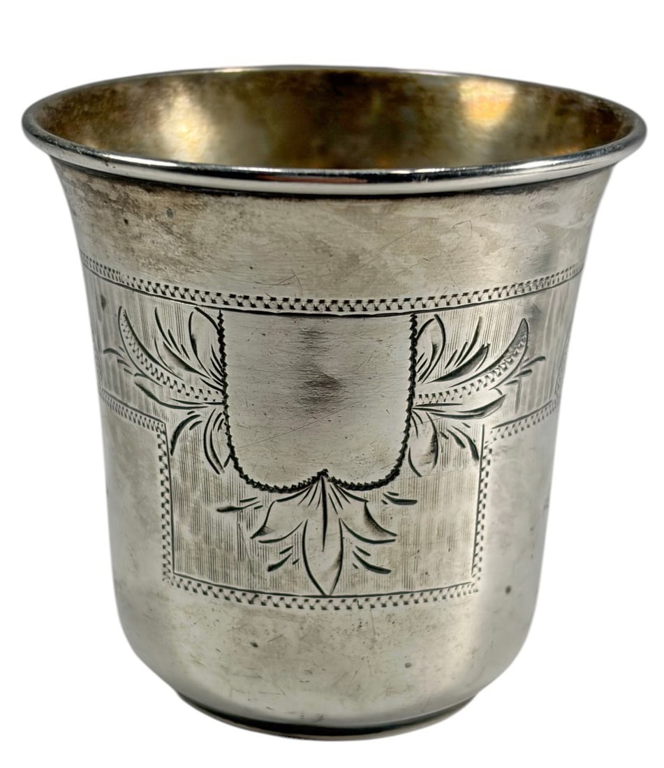 Antique Russian Silver Kiddush or Vodka Cup: Antique Russian silver cup with slightly flared cylindrical form, engraved with floral, geometric, and foliate panels. Marked with 84 standard and attributed to maker Viktor Vasilyevich Savinsky. Tota