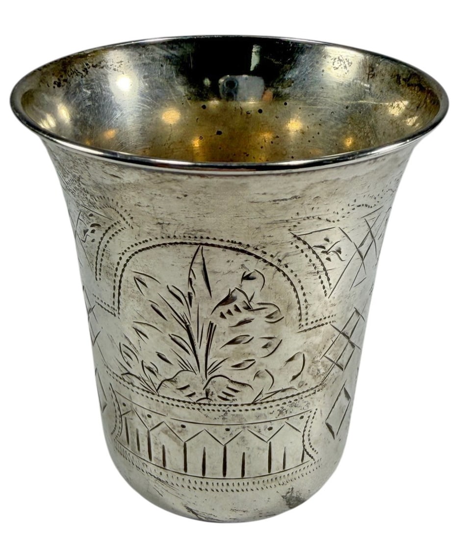 Antique Russian Silver Kiddush or Vodka Cup: Russian silver cup with slightly flared cylindrical form and rolled rim, engraved with geometric and foliate panels. Marked with 84 standard and attributed to maker Lev Fridrikhovitch Kaminsky. Total