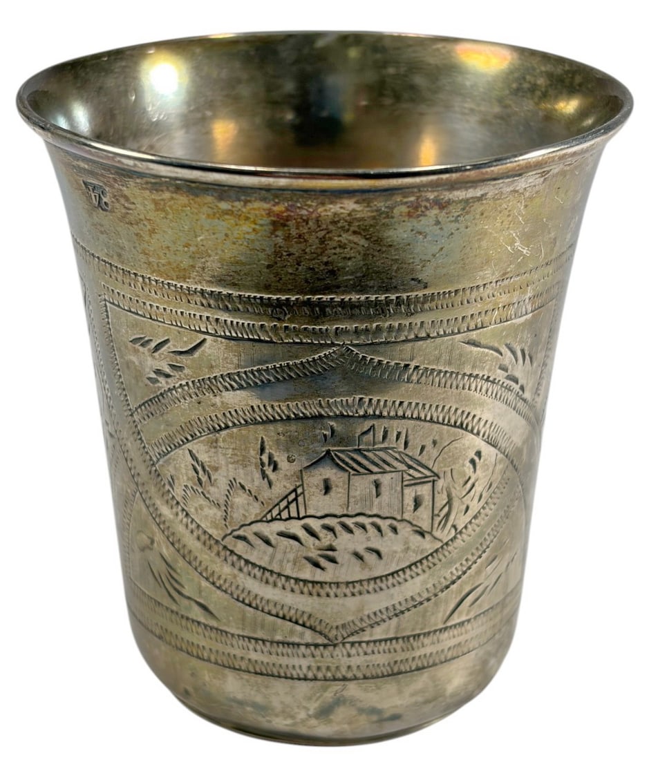 Antique Russian Silver Kiddush or Vodka Cup: Russian silver cup with slightly flared cylindrical form and rolled rim, engraved with floral panels and a central village scene. Marked with 84 standard and attributed to maker Viktor Vasilyevich Sav