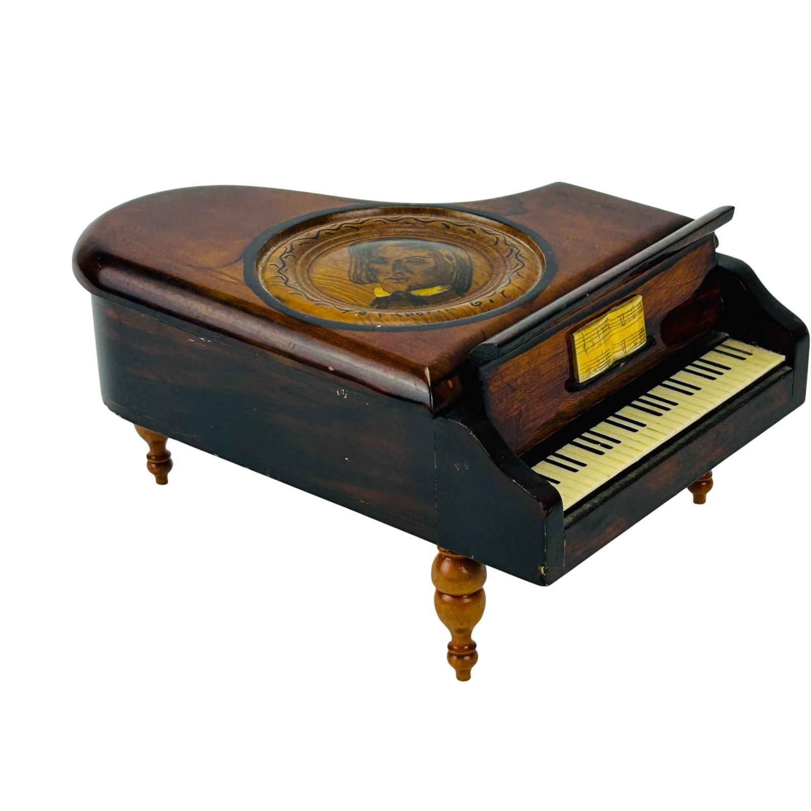Reuge Chopin Wood Case Mini Piano Swiss Music Box: Reuge miniature piano form musical box with wood case and hinged lid. Top inset with a portrait medallion labeled Chopin. Interior fitted with blue fabric lined compartment. Keyboard details at front