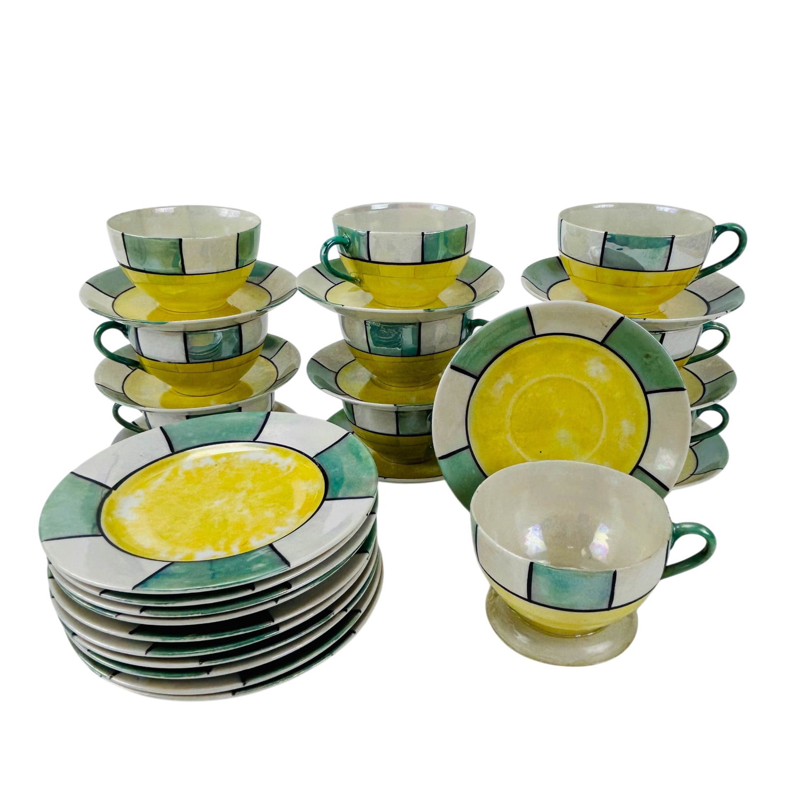 Japanese Porcelain Luster Cup Saucer Plate 30p LOT: Japanese porcelain lusterware teacups, matching saucers and bread and butter plates -ten trio sets total of thirty pieces. Each example decorated with a geometric inspired segmented band design and ce