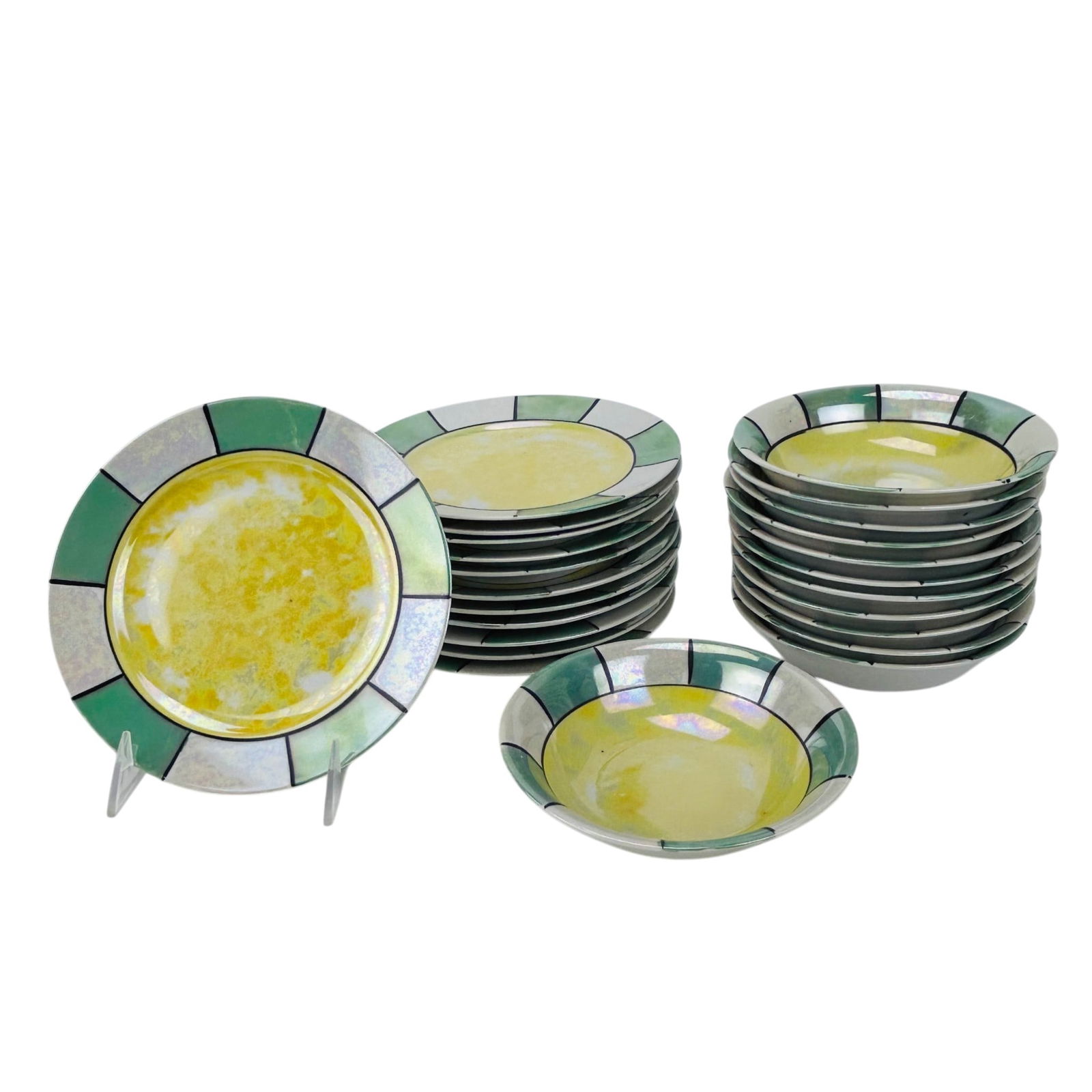 Japanese Porcelain Art Deco Luster Plate Bowl 24pc: Japanese porcelain lusterware twelve salad plates and twelve fruit cereal dessert bowls. Total of twenty four pieces. Each example decorated with a geometric inspired segmented band design and central