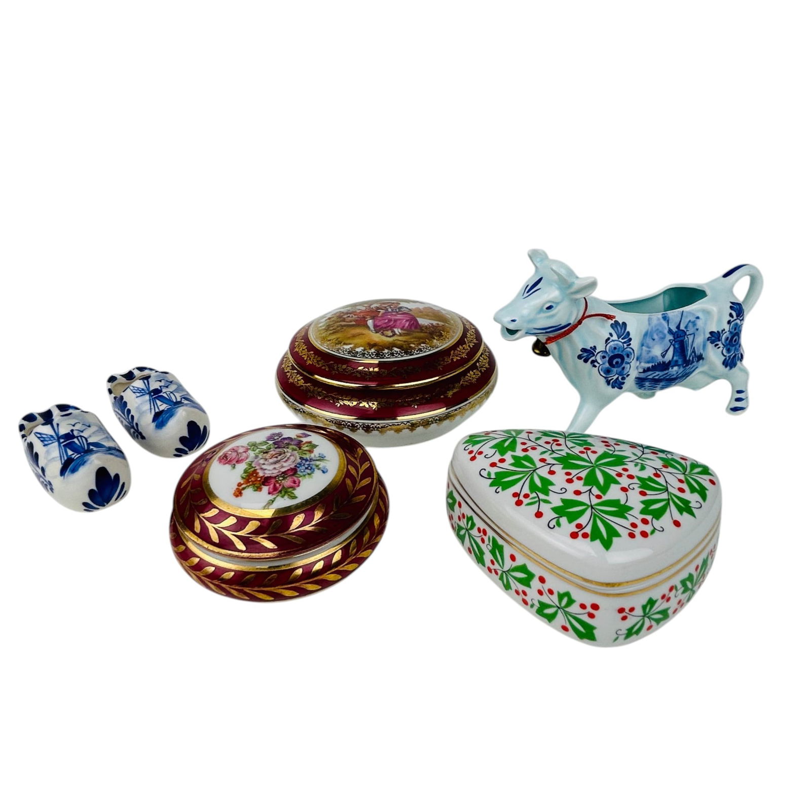 Limoges Hollohaza Delft Porcelain Box Creamer LOT: Grouping of five European porcelain decorative items including a Limoges France porcelain dresser box with courting scene decoration and gilt borders, a Limoges floral trinket box with burgundy ground