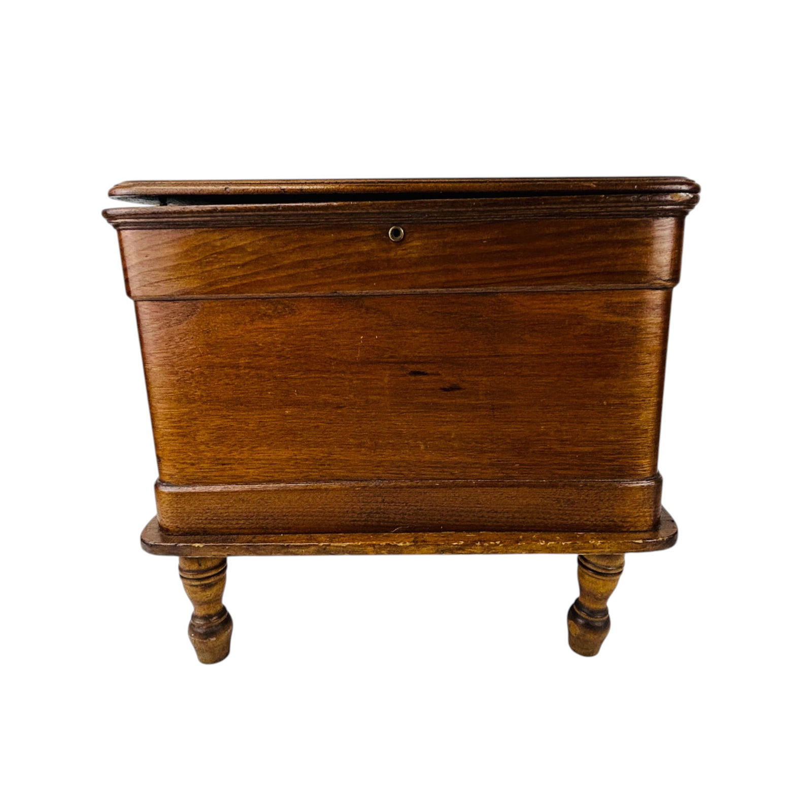 Antique Wood Sewing Storage Wooden Chest Box: Early 20th century wood storage chest with hinged lid and interior compartment. Rectangular form raised on four turned feet. Interior fitted with lid support chain and metal hinges. Exterior shows key