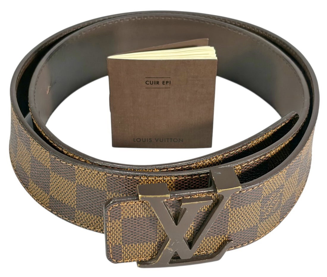 Louis Vuitton Damier Ebene Style Monogram Belt: Louis Vuitton style, a Damier Ebene canvas LV Initiales belt featuring the signature checkerboard coated canvas with smooth leather backing and a prominent LV monogram buckle in matte brown tone metal