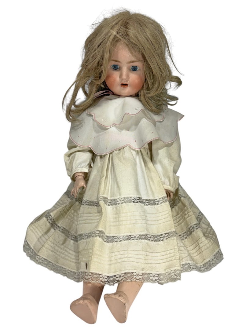 Simon & Halbig Israel Large Bisque Head Child Doll: Antique Simon & Halbig bisque head doll, marked 'Germany S&H 914 12,' Israel model, with blue glass sleep eyes, open mouth, composition body, dressed in period clothing.Dimensions: 29 X 11 X 6.5 in. C