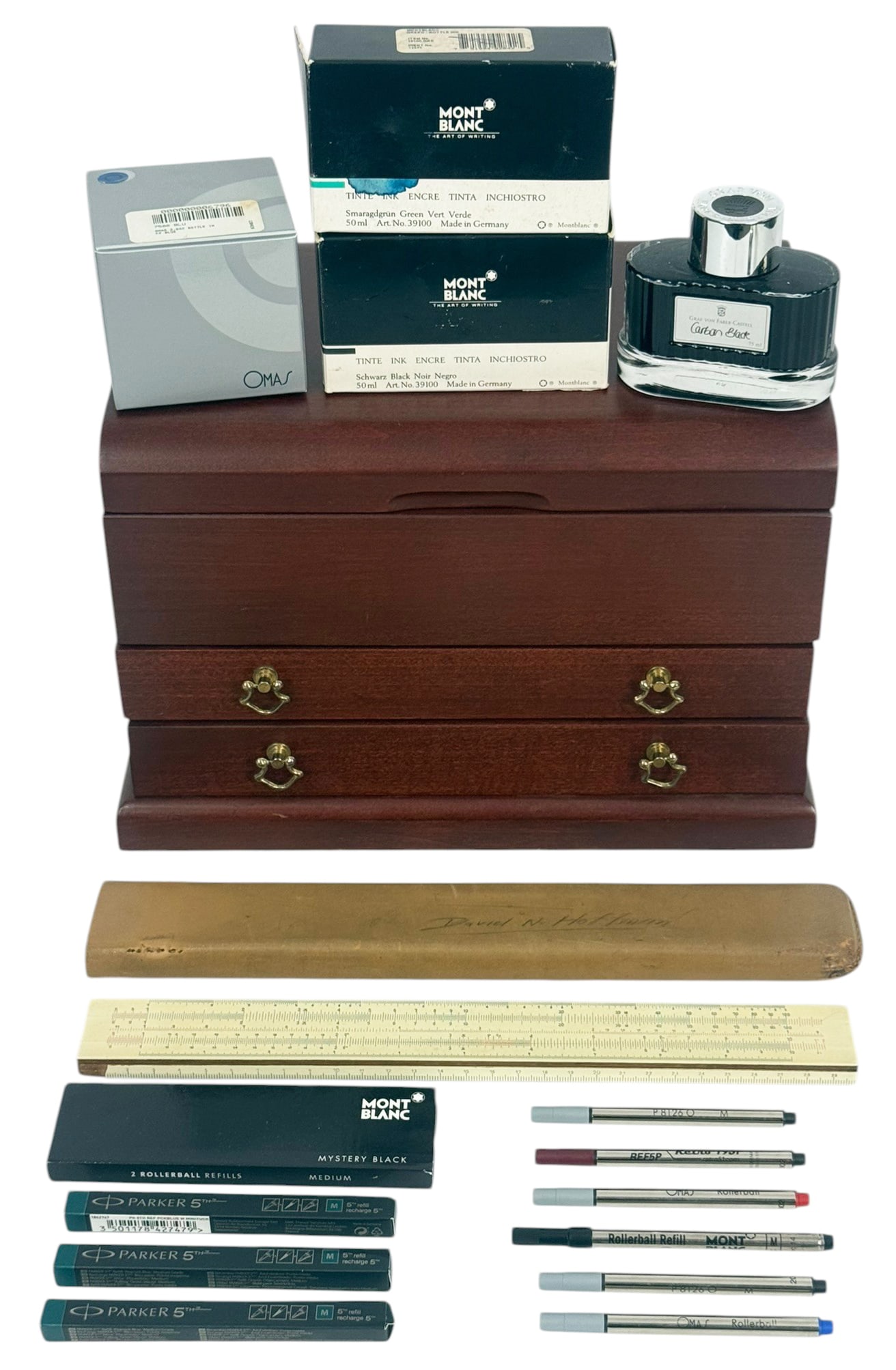 Montblanc Omas Graf von Faber Castell Accessories: Lot of thirteen collectible pen boxes. To include: Montblanc Omas Graf von Faber Castell, a grouped writing accessories lot including ink bottles refills and storage case. The lot features Montblanc b